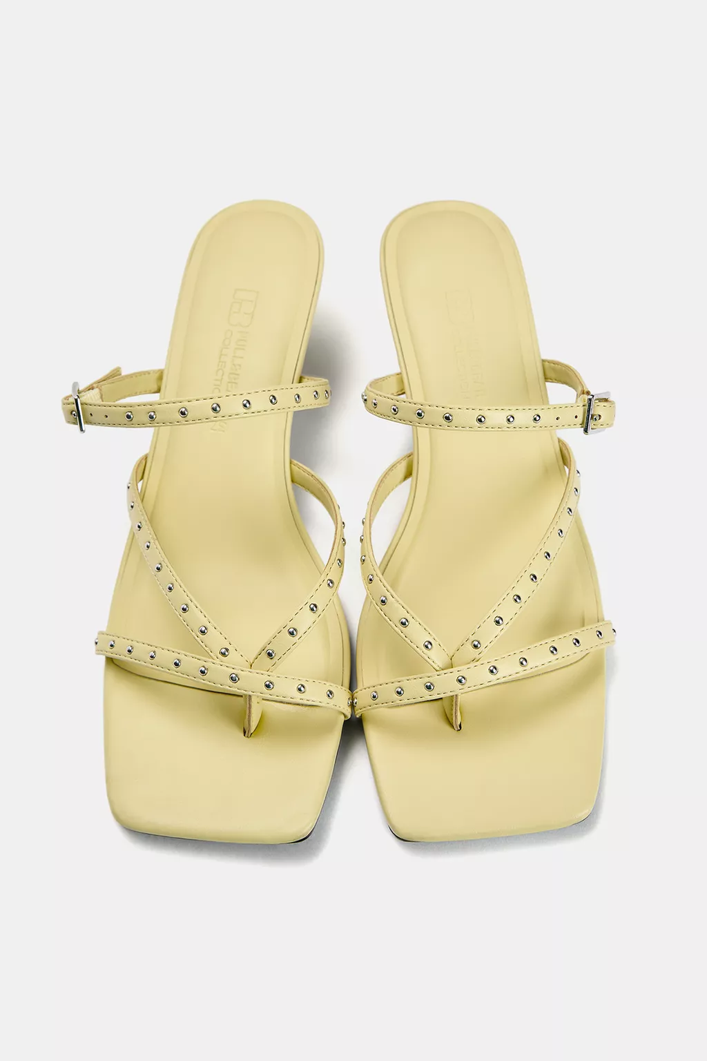 Heeled sandals with studs