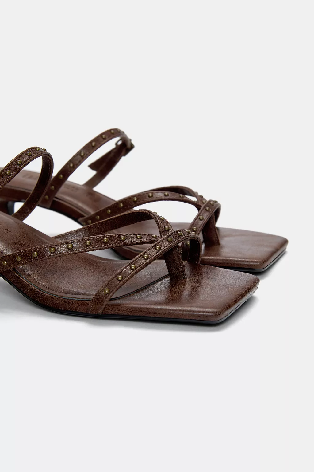 Heeled sandals with studs