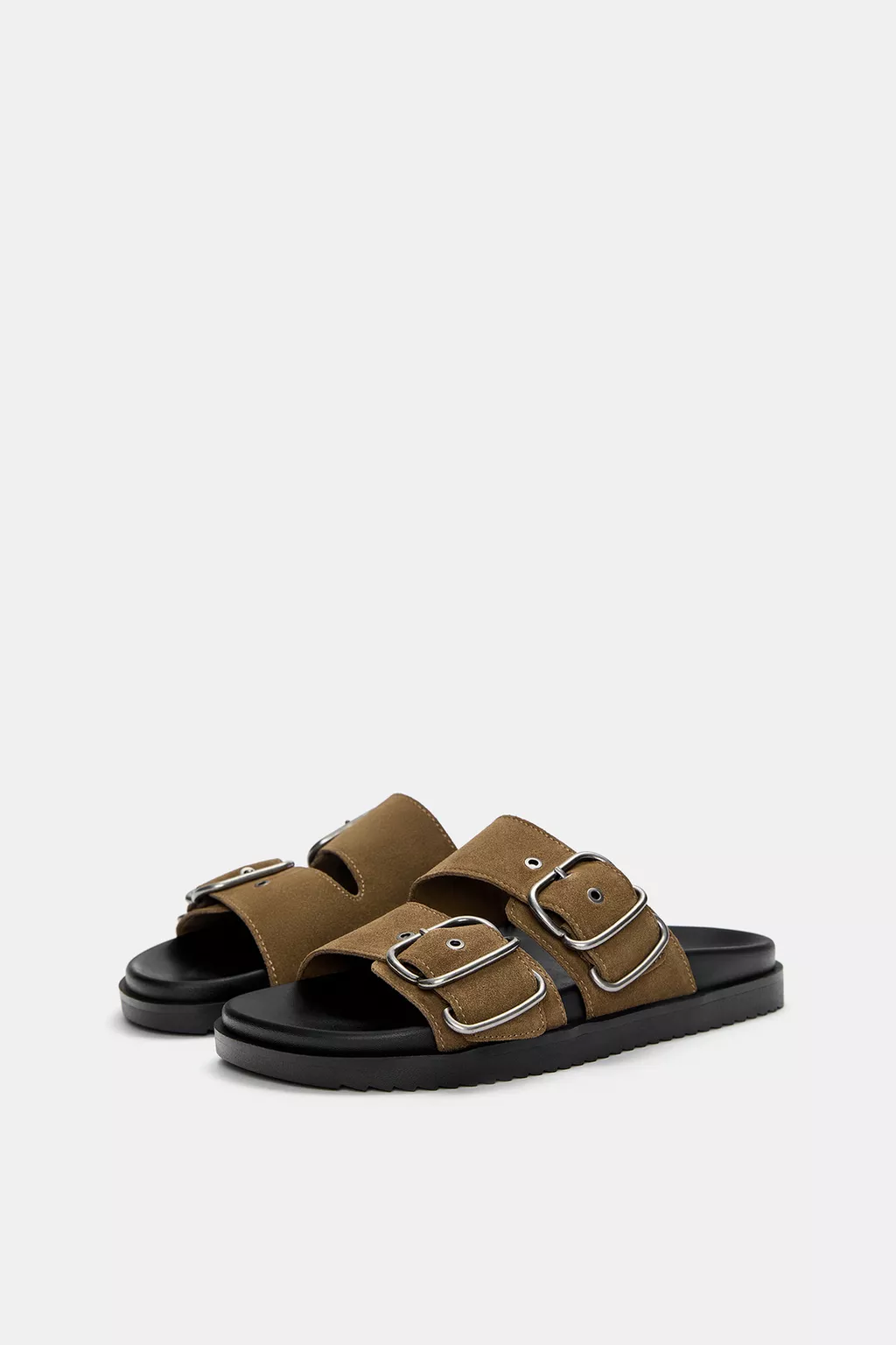 Flat leather sandals with buckles