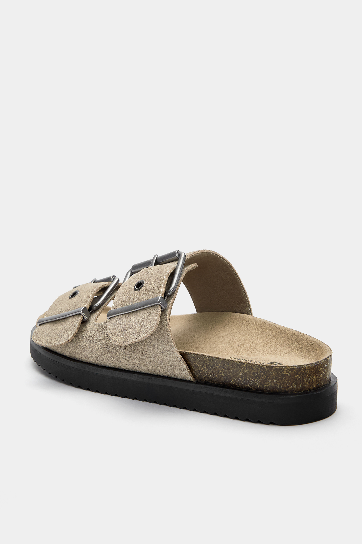 Flat leather sandals with buckles