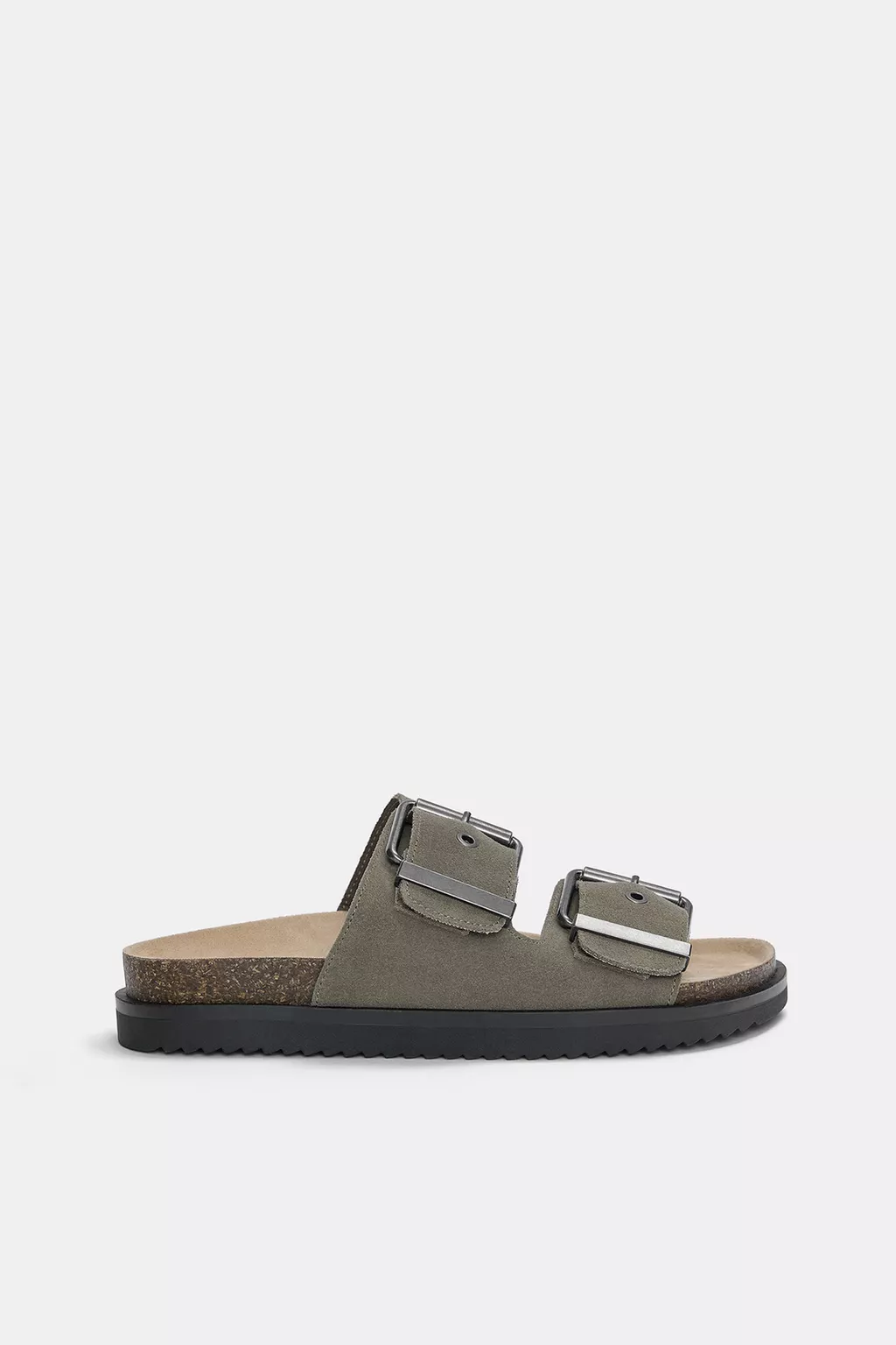 Flat leather sandals with buckles