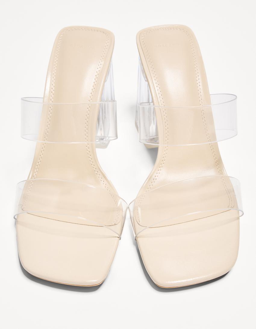 Heeled sandals with vinyl straps