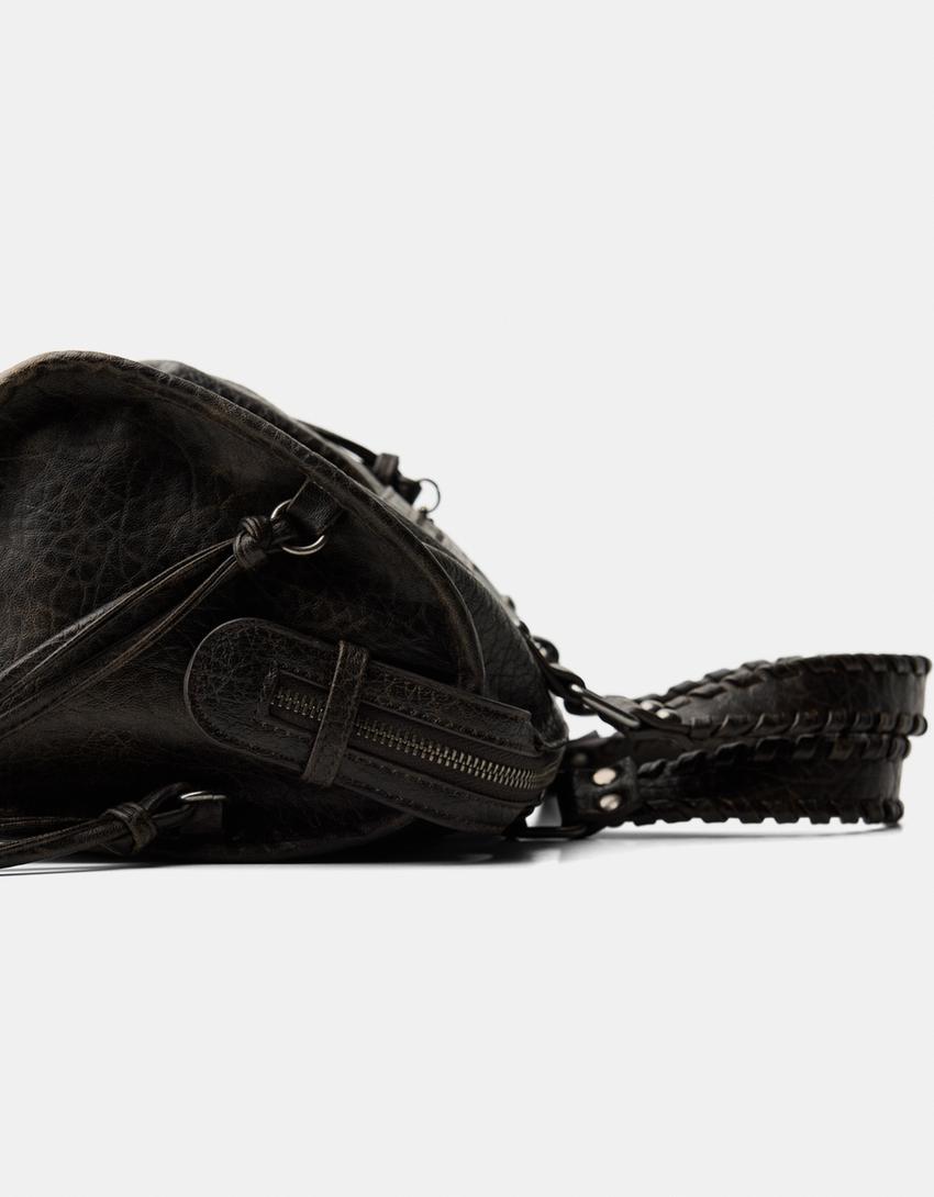 Worn-effect bowling bag with straps