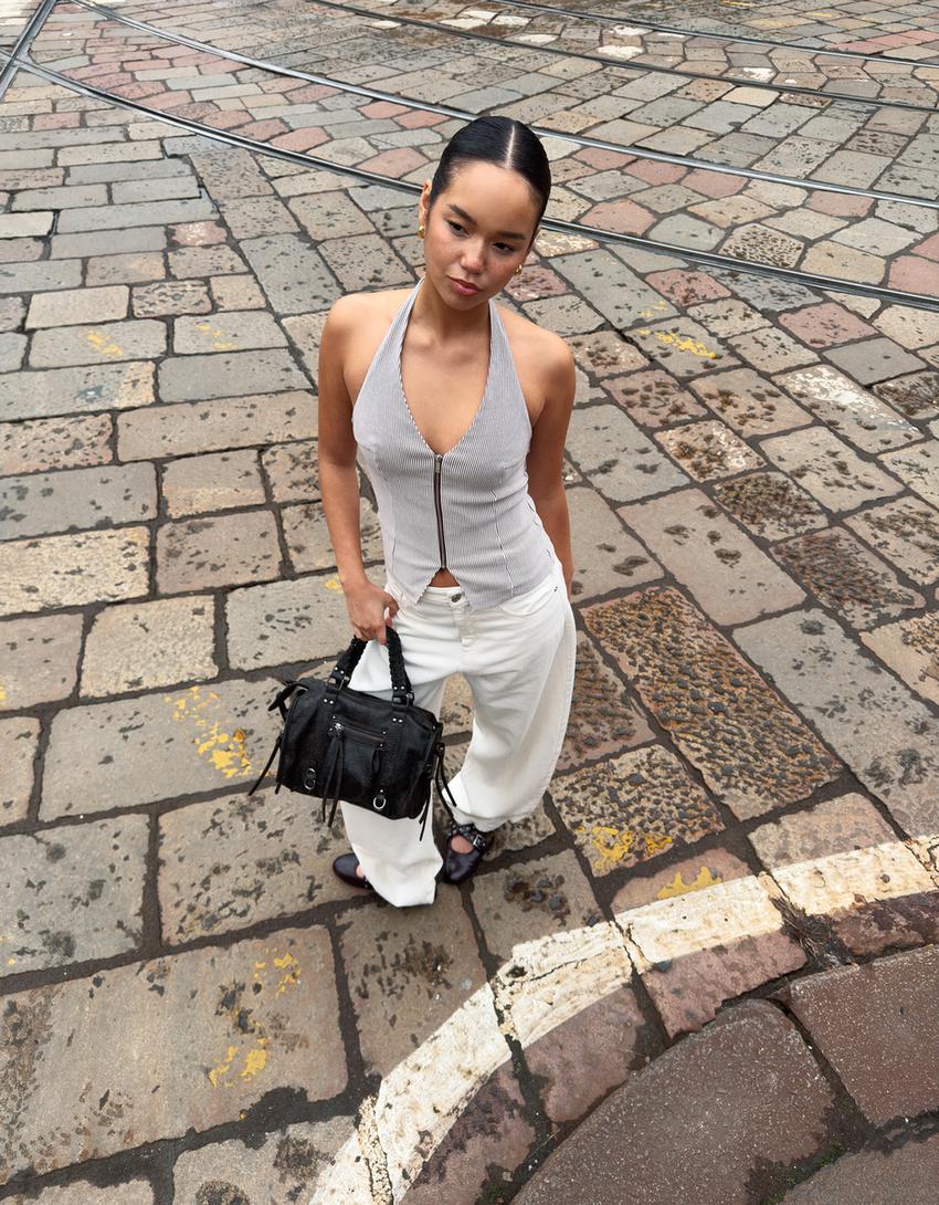 Worn-effect bowling bag with straps