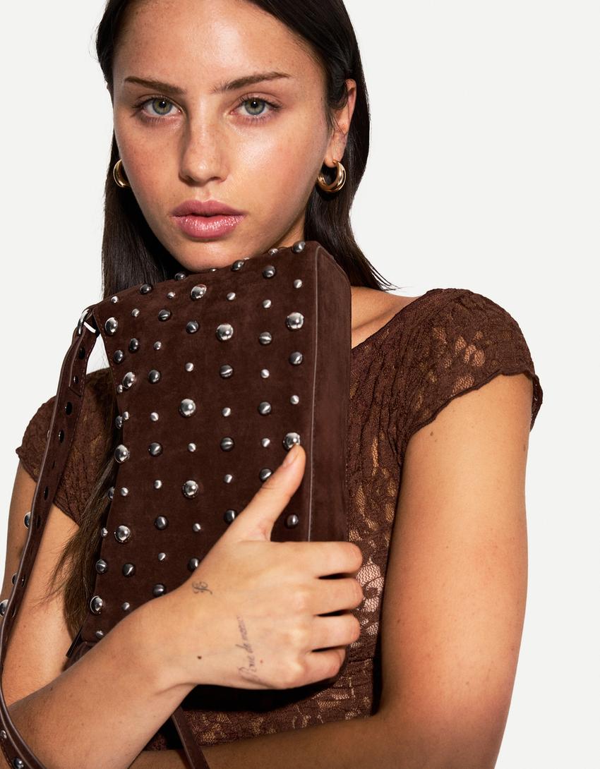 Studded faux suede bag