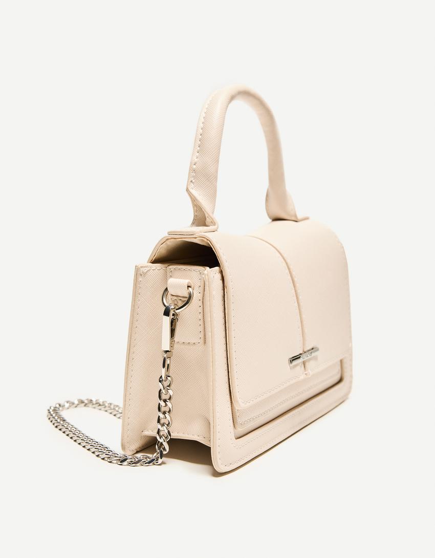 Studded faux suede bag