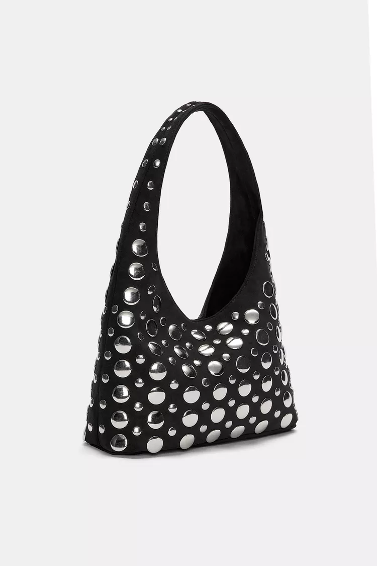 Studded arm bag