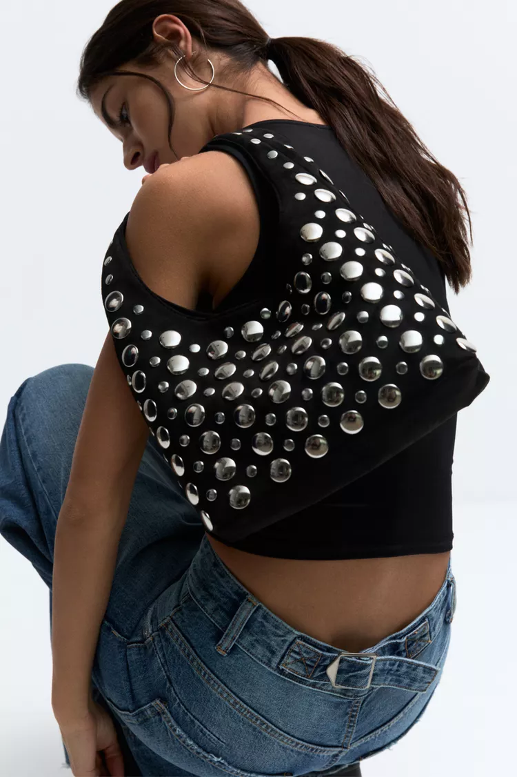 Studded arm bag