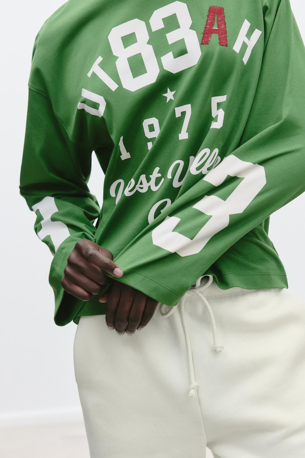 T-SHIRT WITH EMBROIDERED SLOGAN