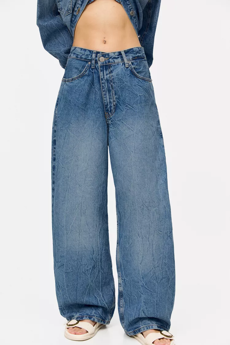 Super baggy jeans with crossover waist