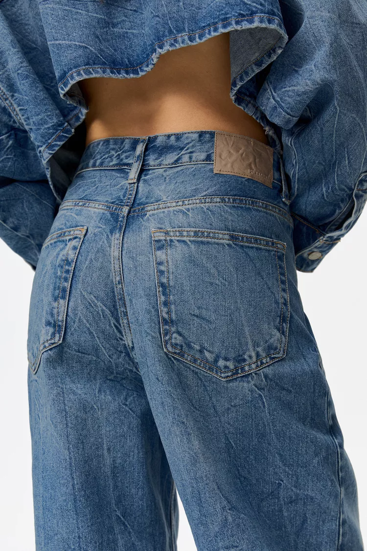 Super baggy jeans with crossover waist