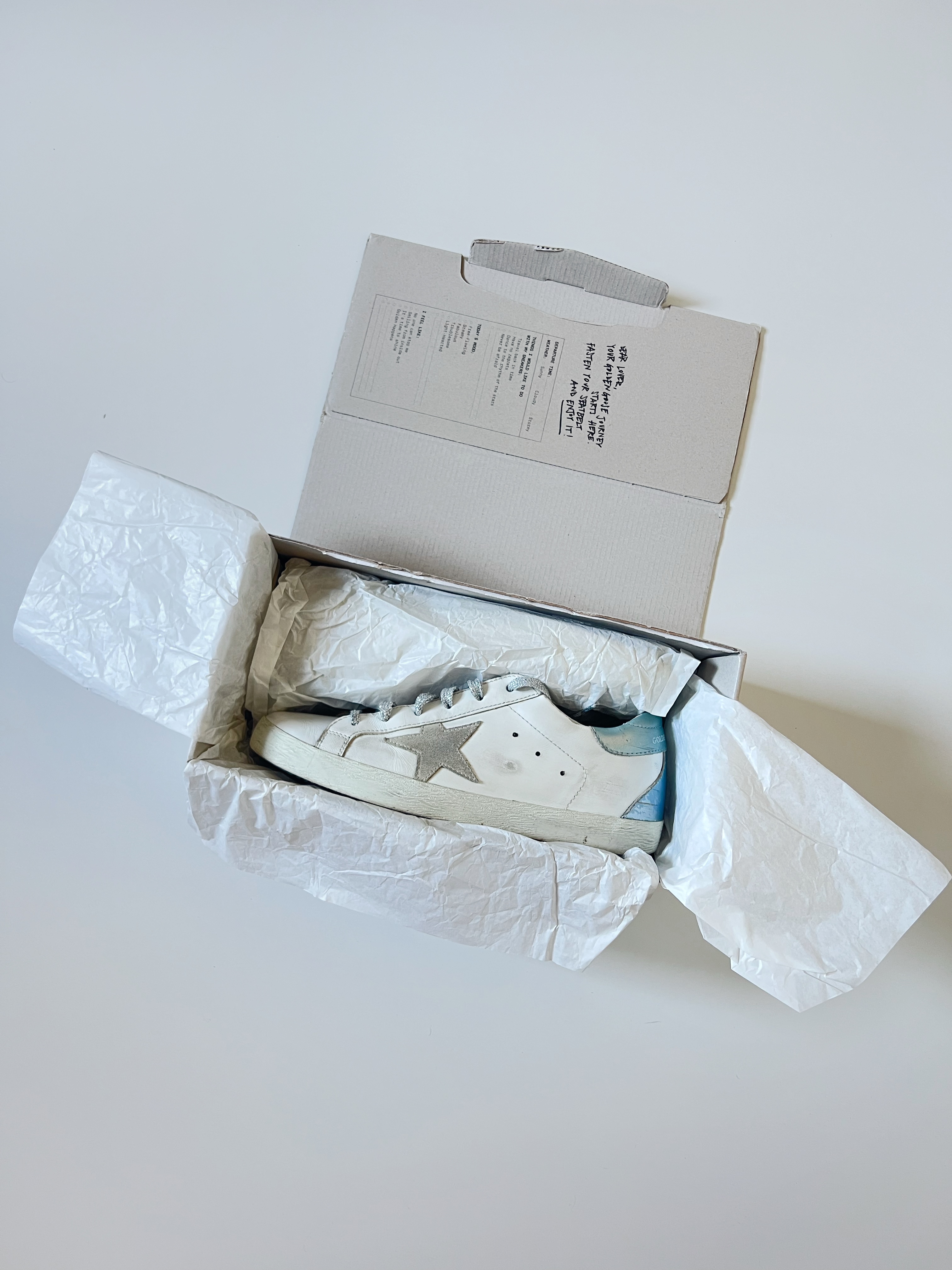 White/light blue superstar