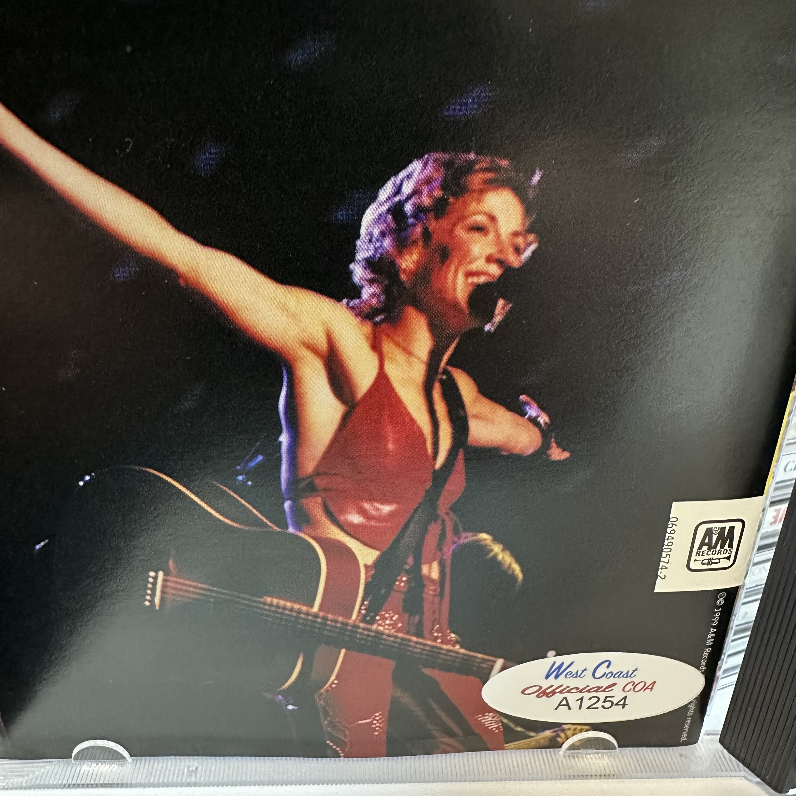 A1254 Sheryl Crow and Friends signed CD Booklet. Signed by Sheryl Crow, Stevie Nicks, and Sarah McGlachlin 