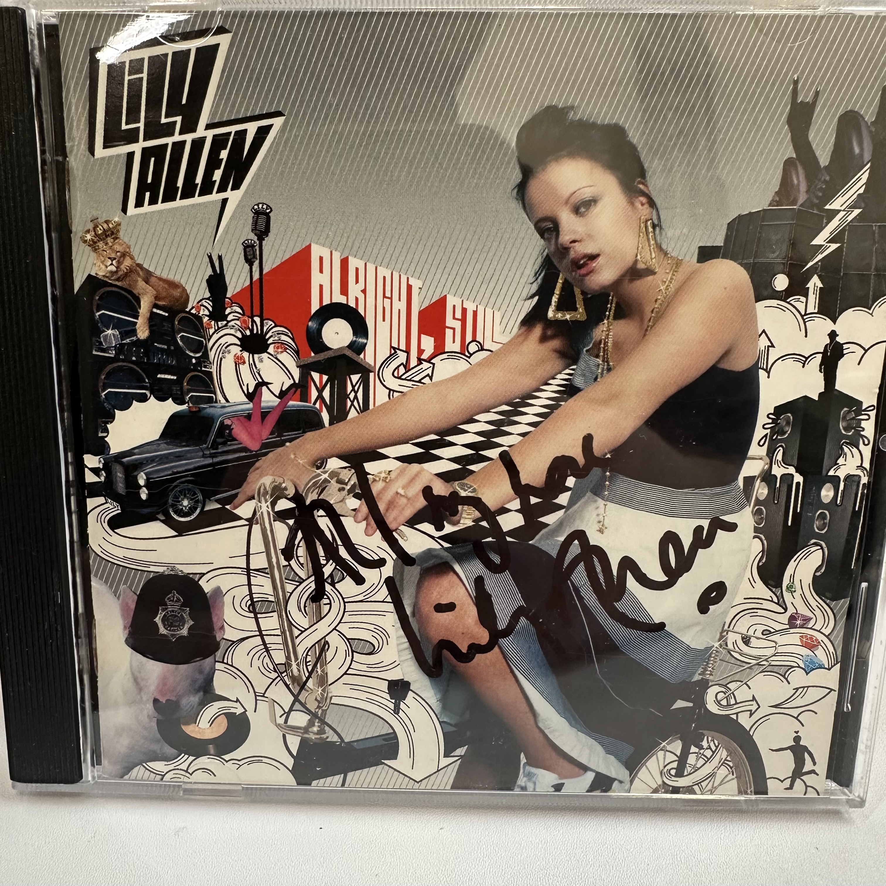 A1276 Lily Allen signed CD booklet