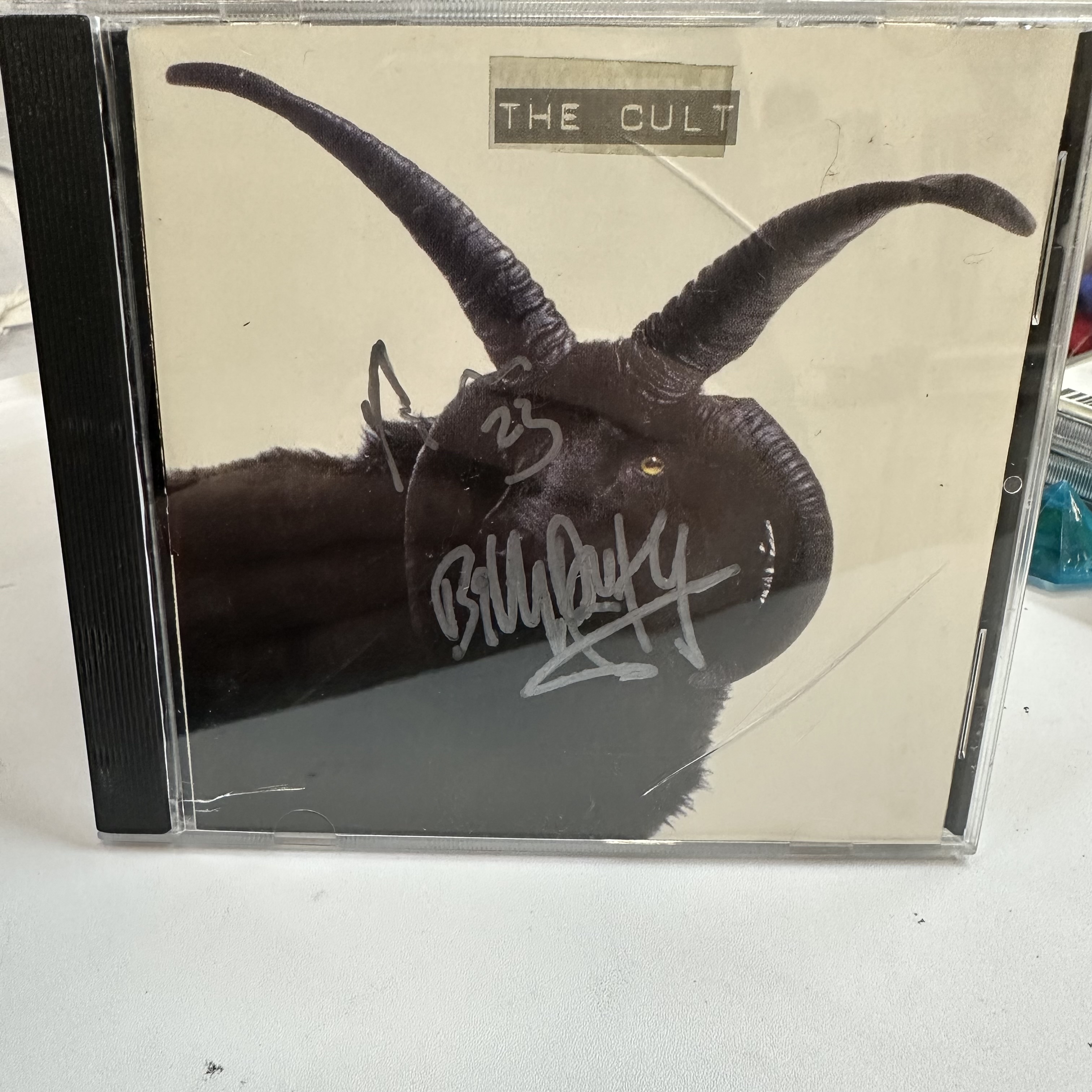A1268 the cult signed cd booklet