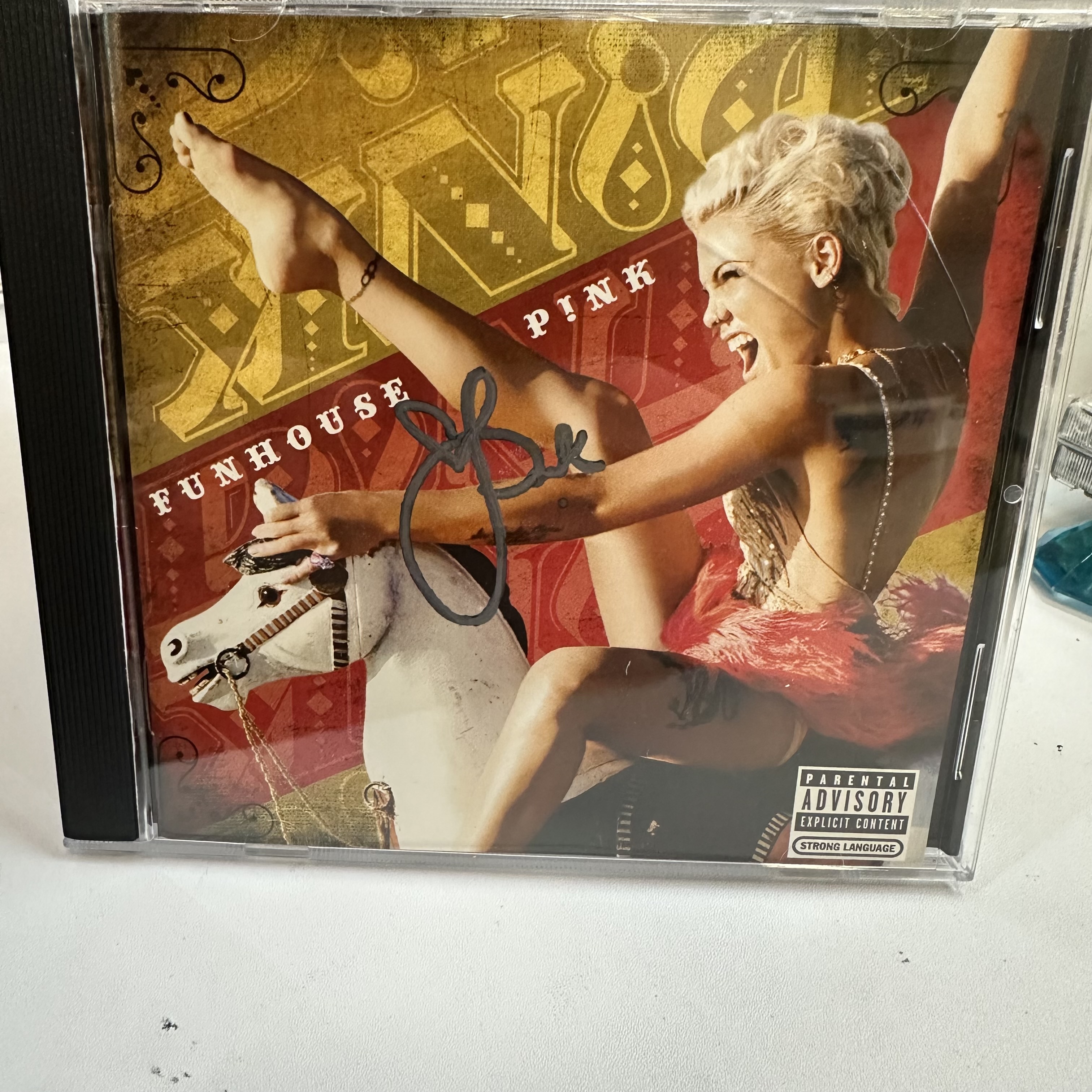 A1262 pink signed cd booklet