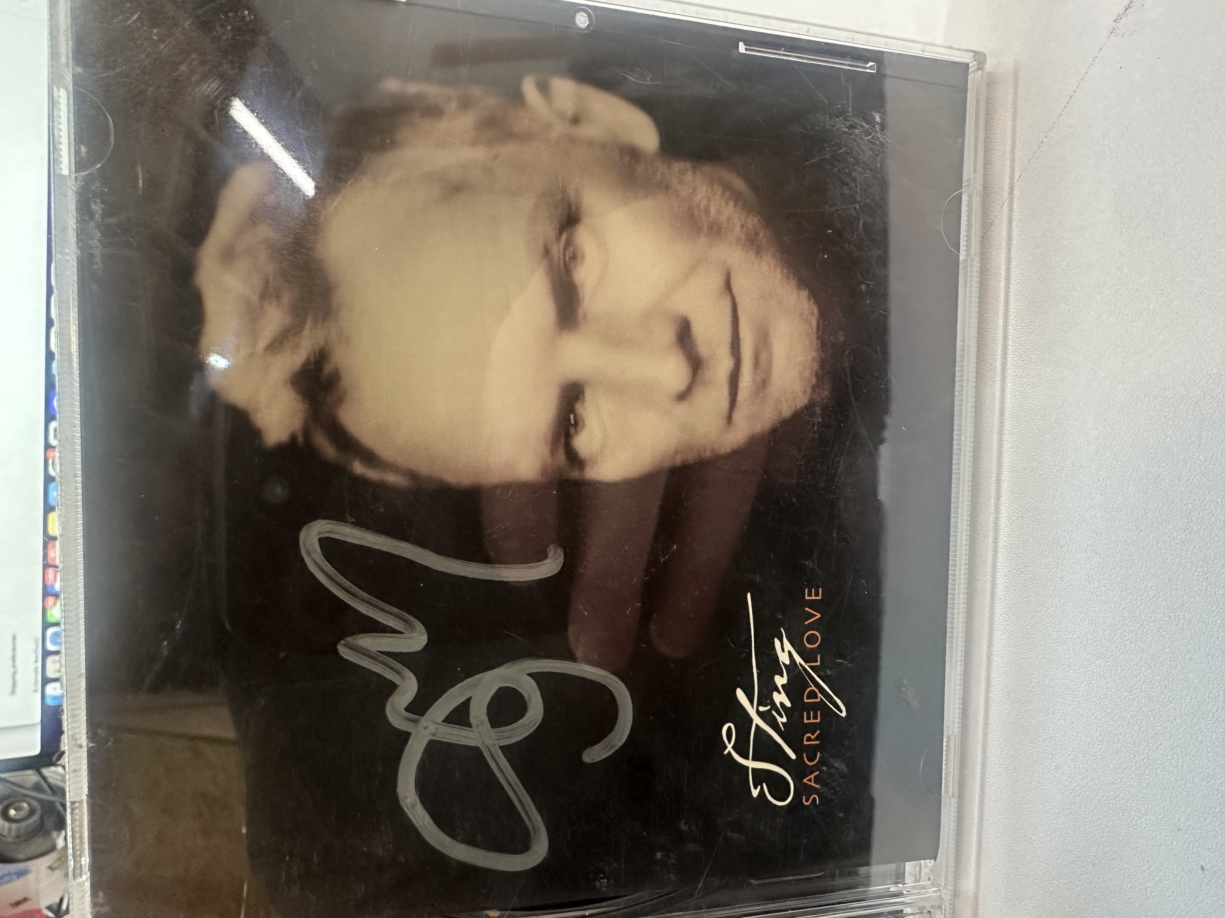 A1250 stinging sacred love, signed, autographed CD