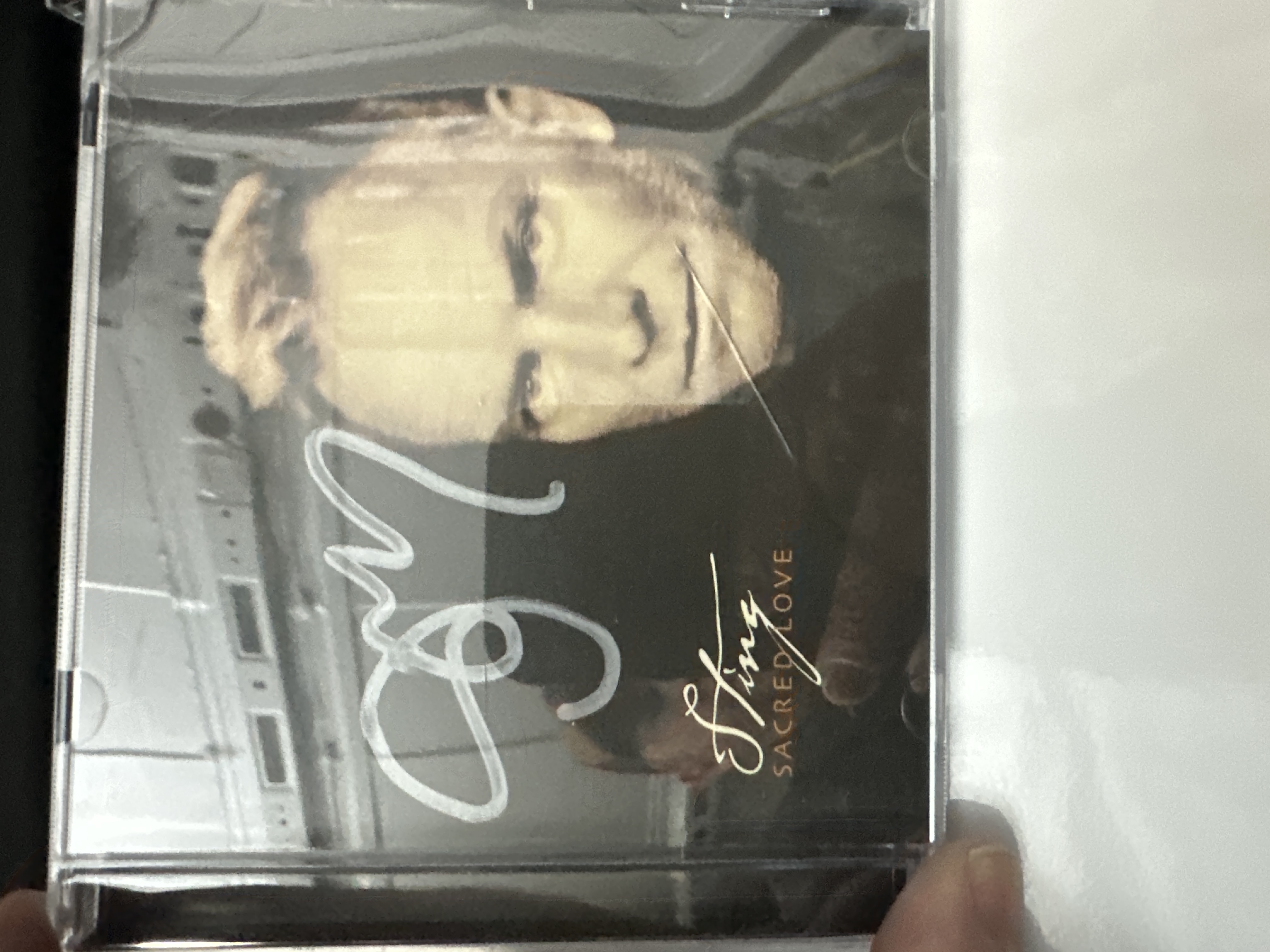 A1251 stinging sacred love, signed autograph CD