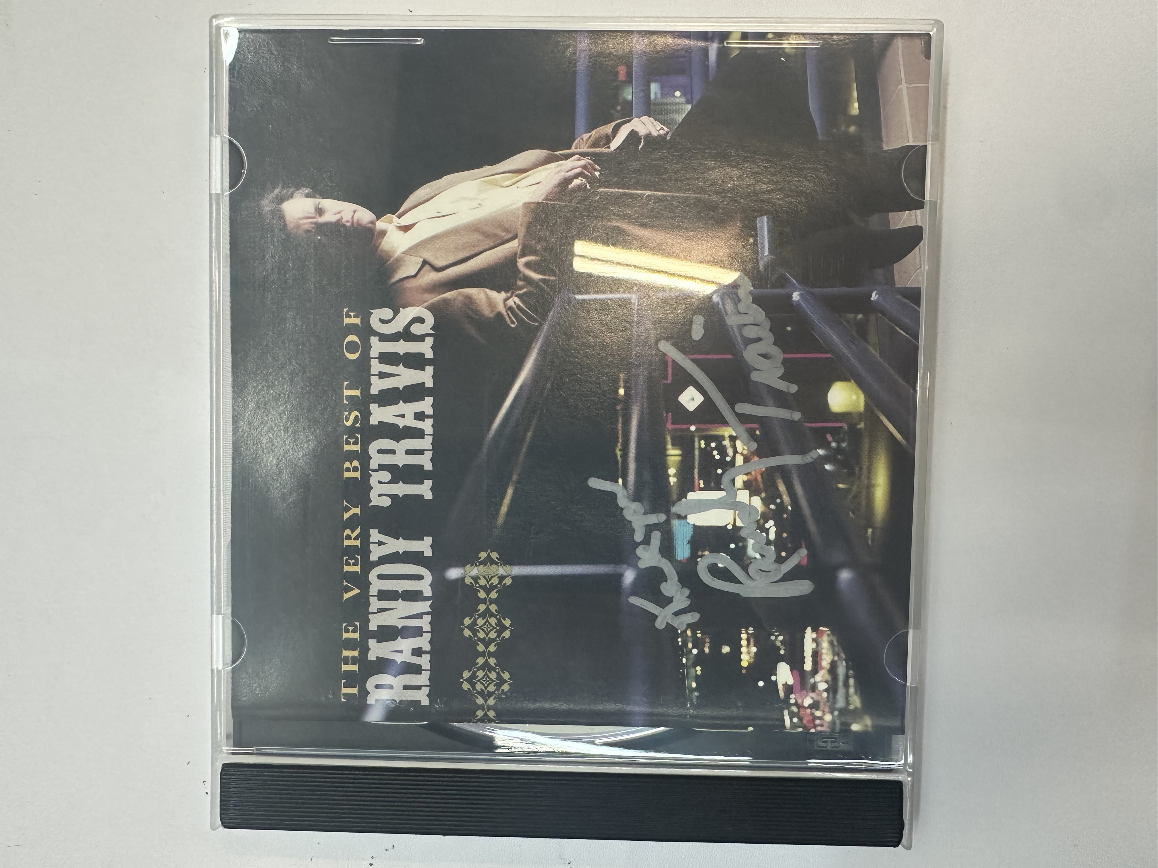 A1391 Randy Travis, the very best of Randy Travis signed autograph CD booklet