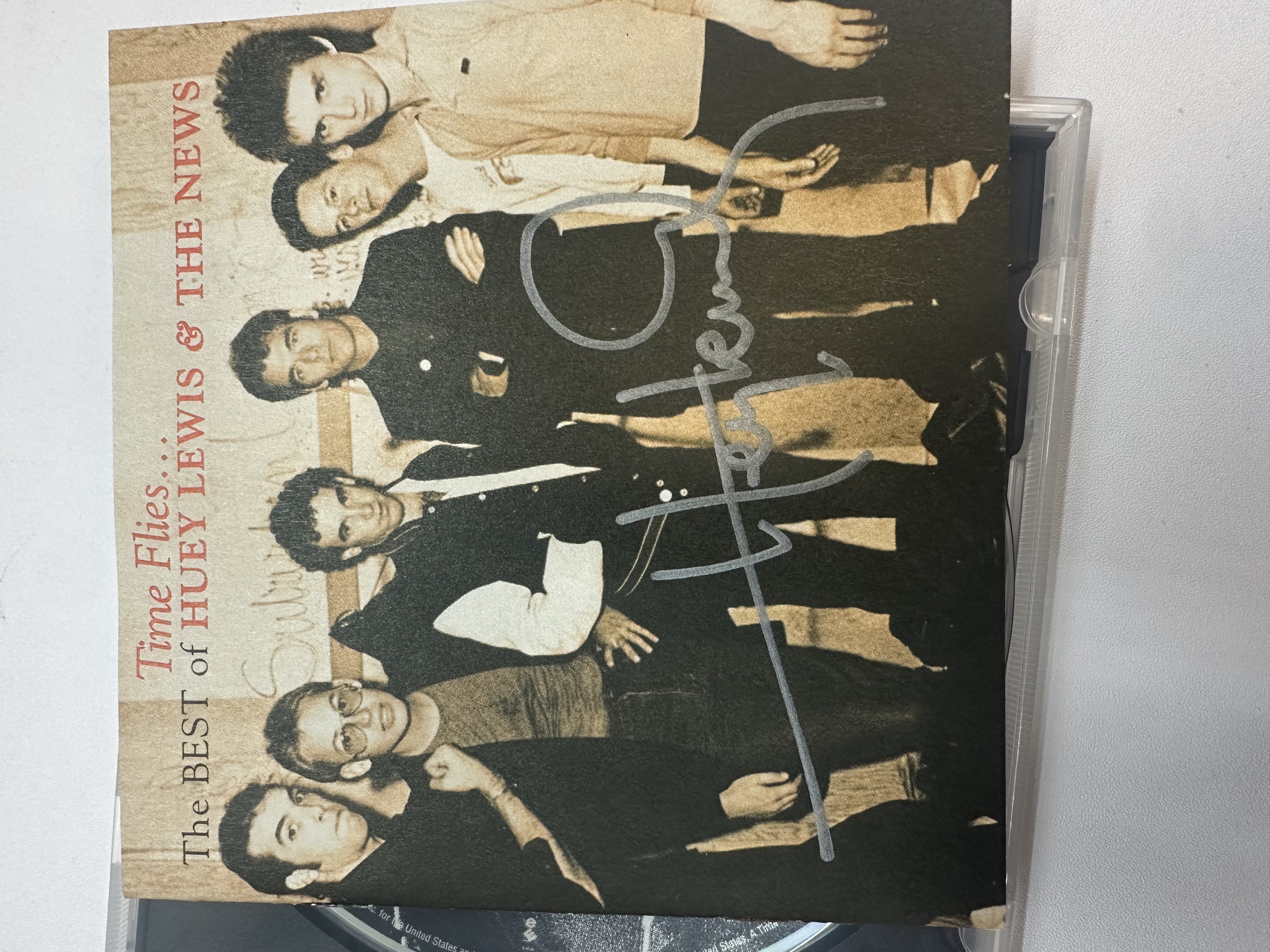 A1367 Huey Lewis and the news signed autograph CD booklet signed by Huey Lewis
