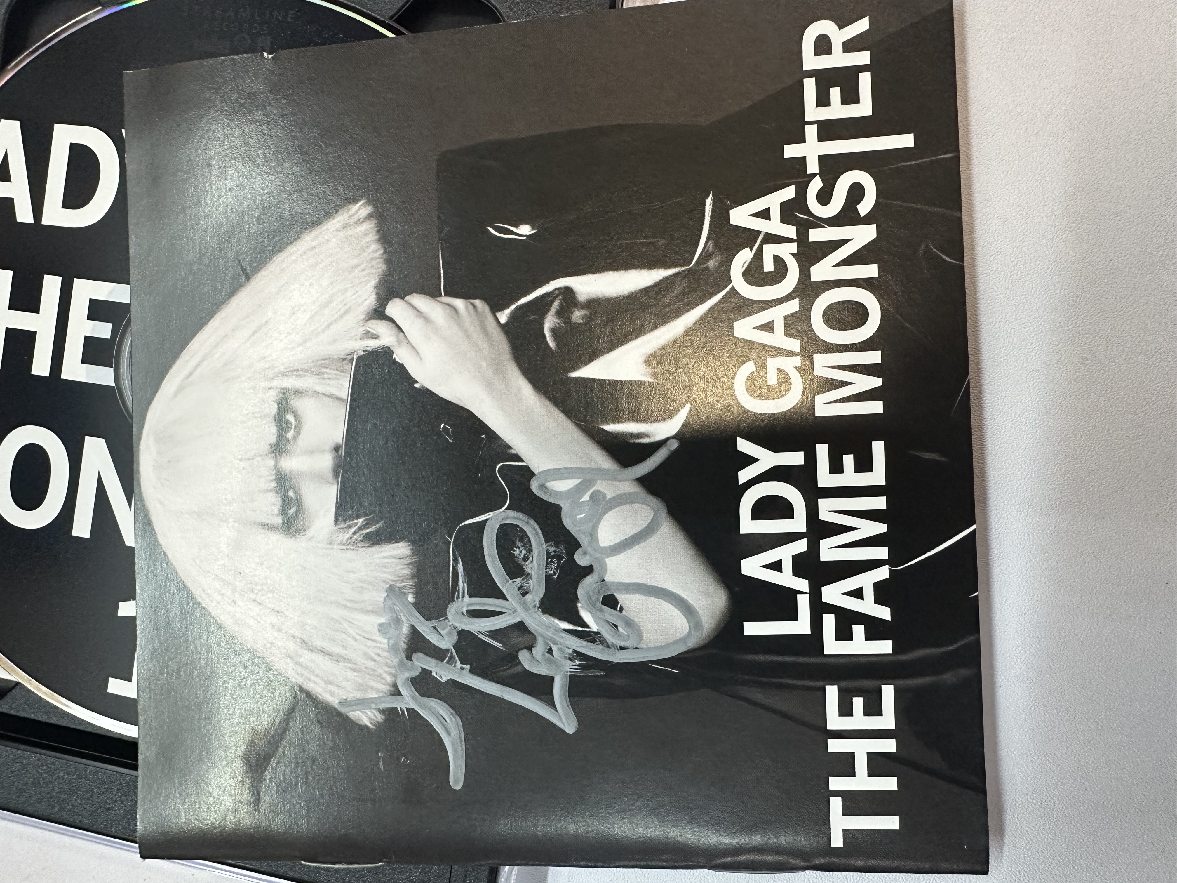 A1297 Lady Gaga fame, monster signed autographed CD booklet