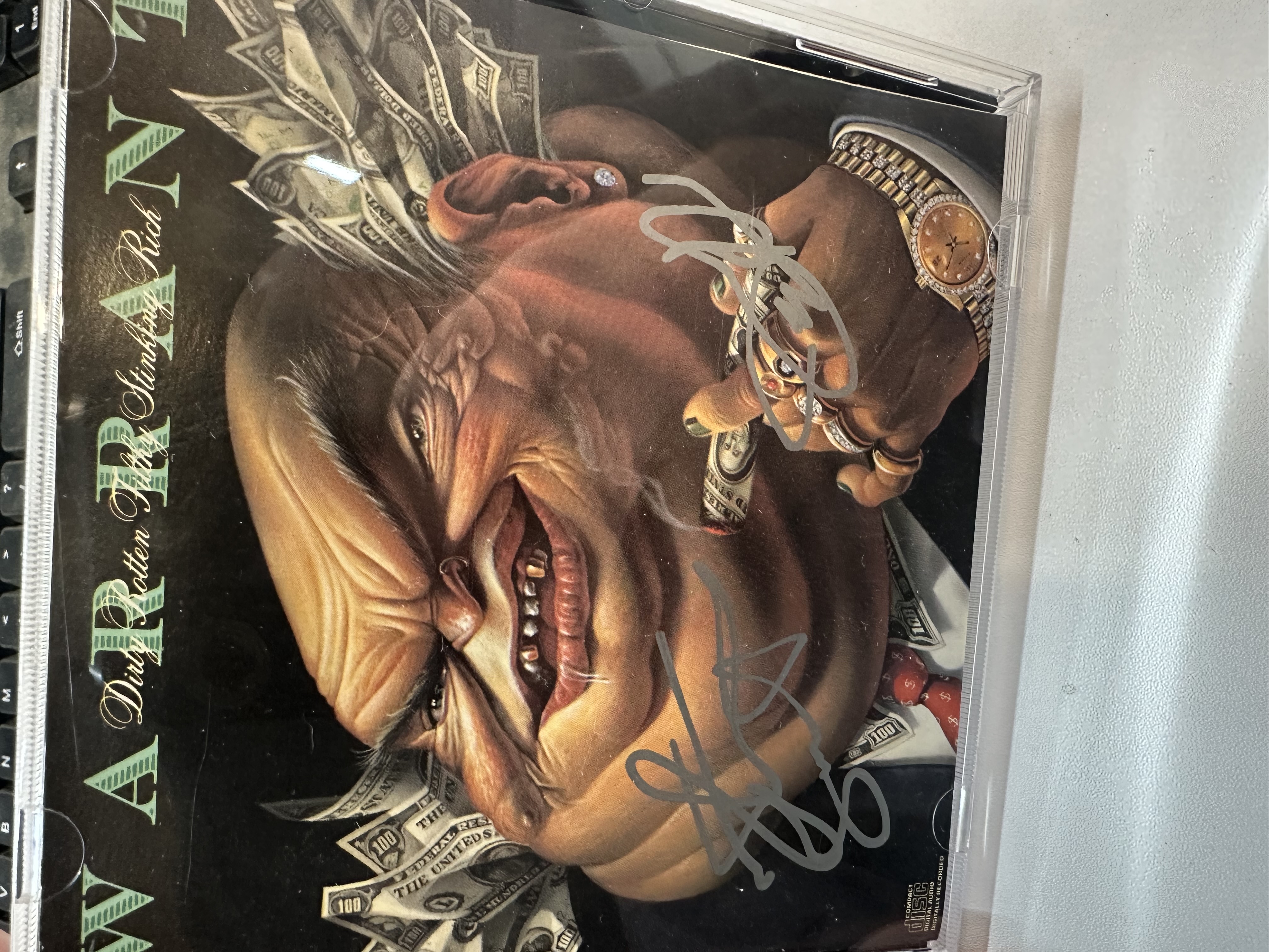 A1203 warrant, dirty, rotten filthy stinking rich, signed, autograph CD cover