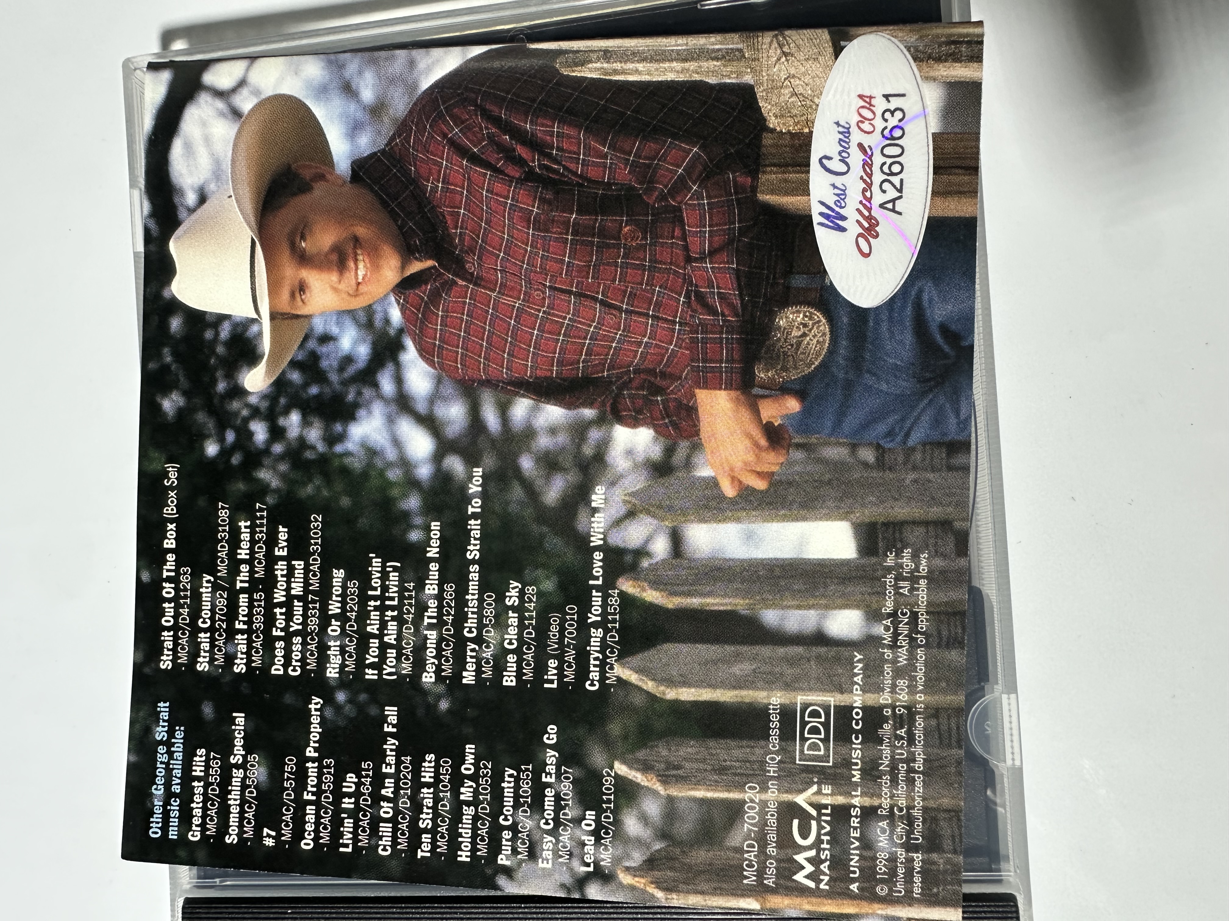 A260631 George Strait one step at a time signed autograph CD booklet