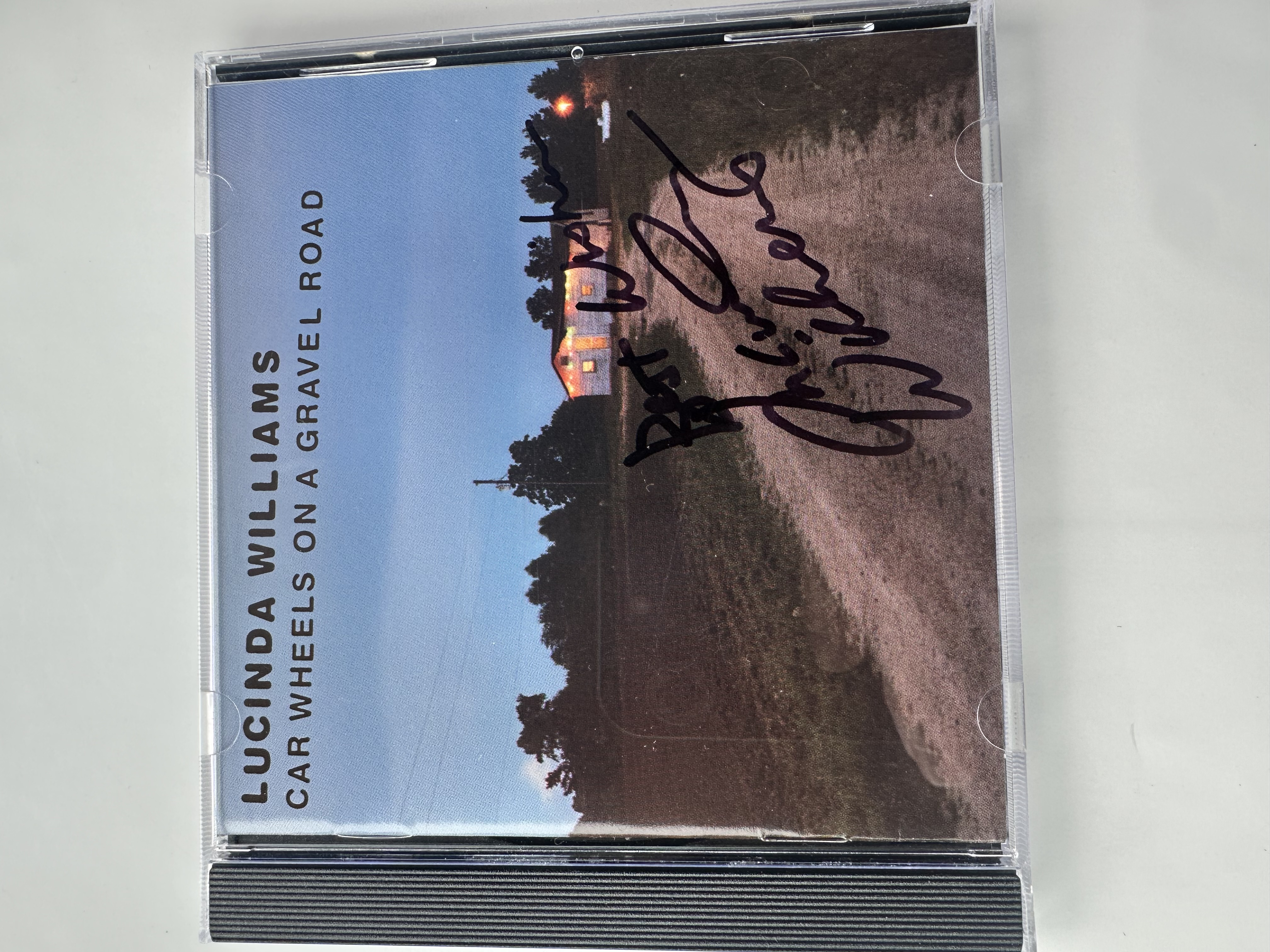 A26074 lucinda Williams car wheels on a gravel road signed autographed CD