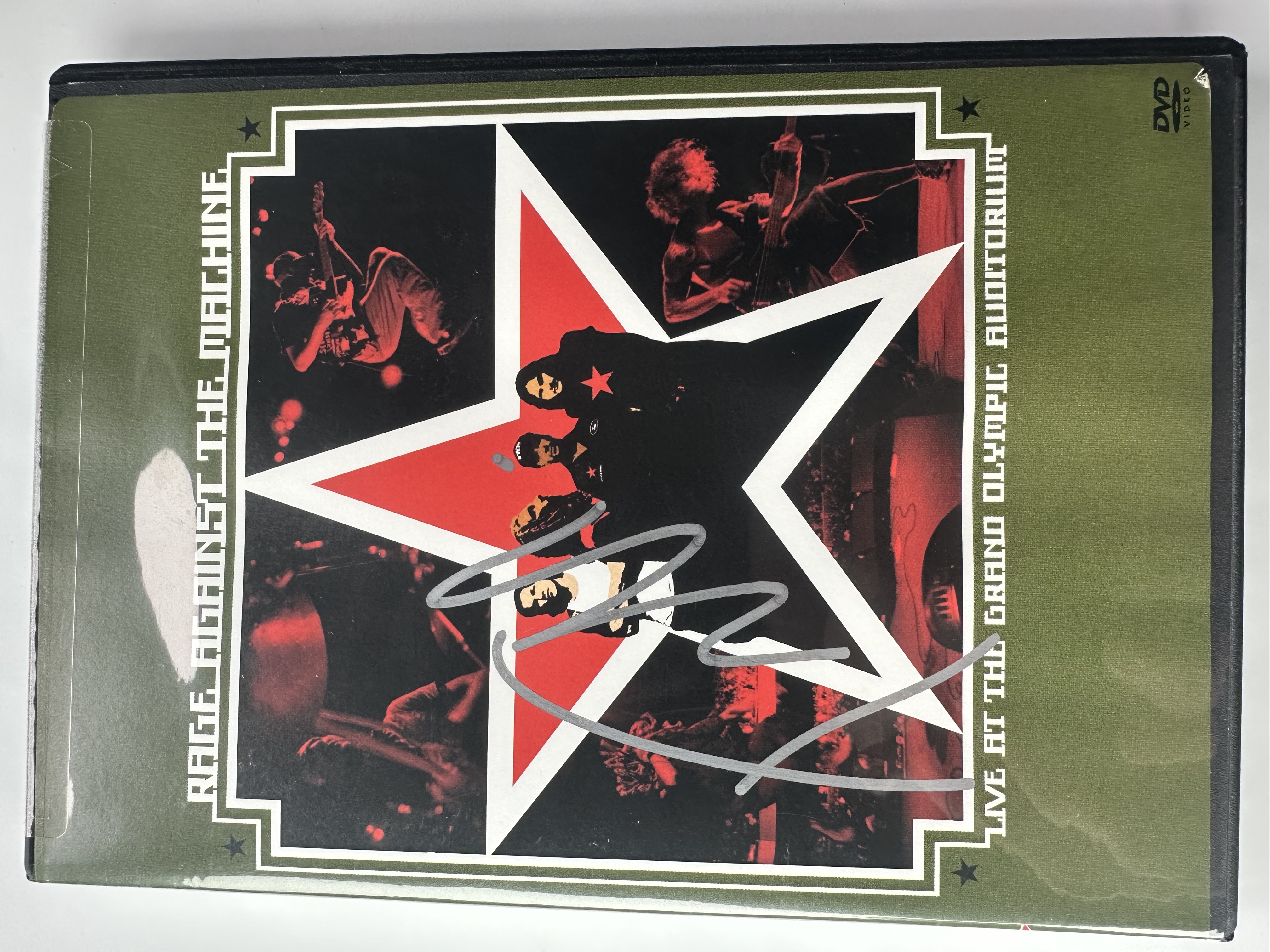 A22030 rage against the machine live at the grand Olympic auditorium DVD signed by Tom Morello