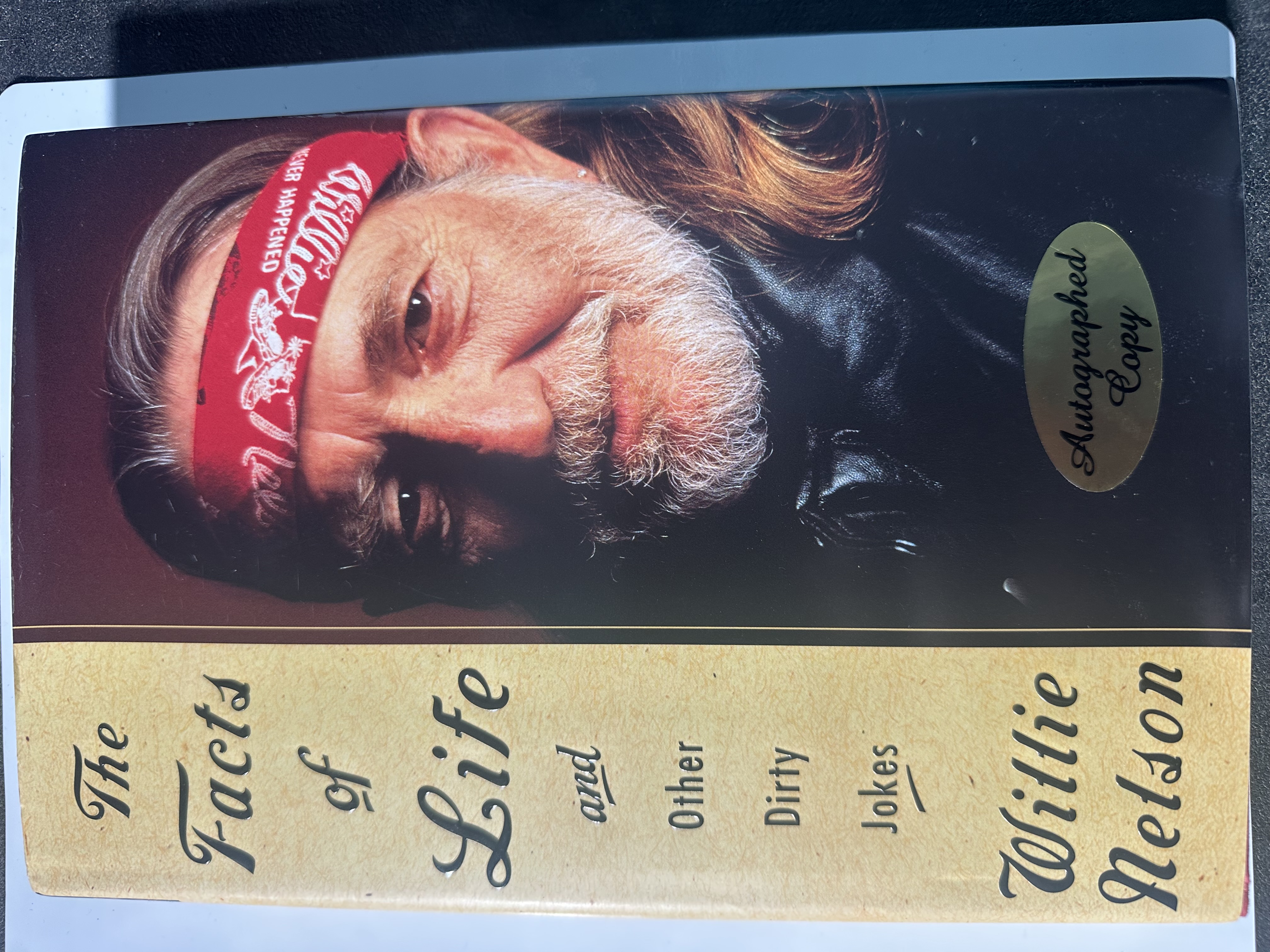 B112931 the facts of life and other dirty jokes by Willie Nelson signed autograph by Willie Nelson