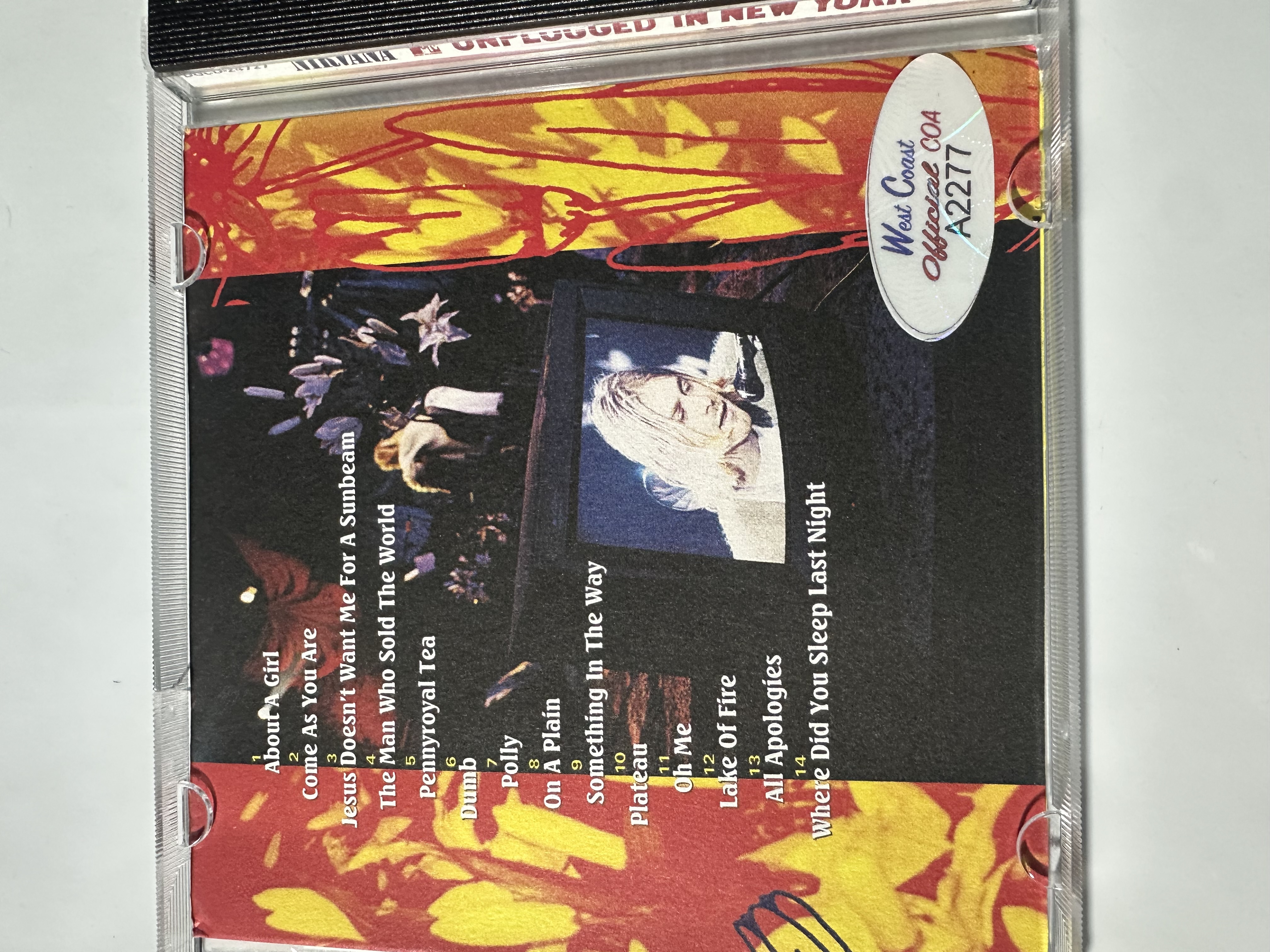 A2277 Nirvana unplugged, signed, autographed CD signed by Kurt Cobain, Chris Novoselic, Dave Grohl