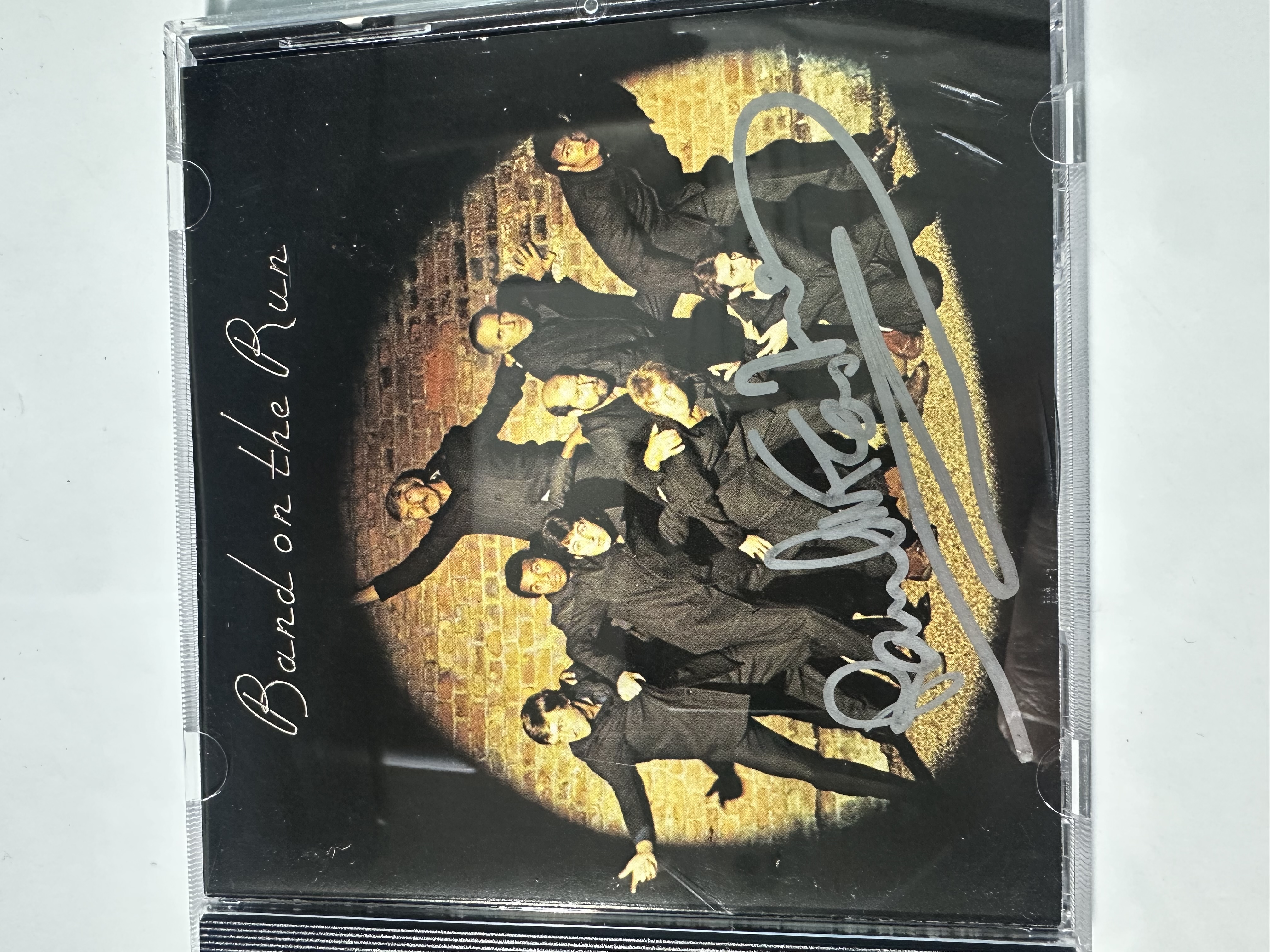 B112781 Paul McCartney and wings signed CD by Paul McCartney