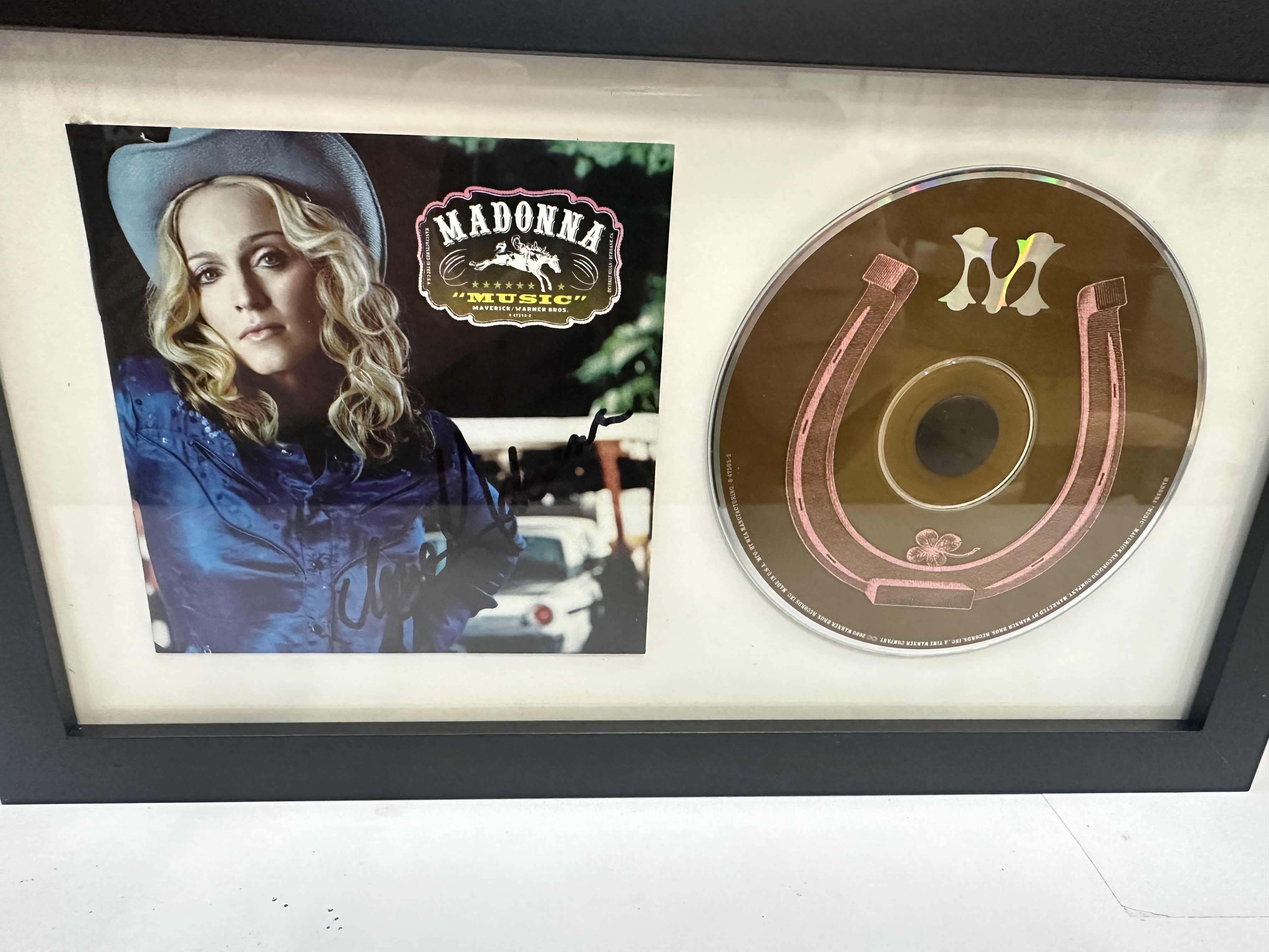 B112362 Madonna, “Music” signed, autograph CD framed
