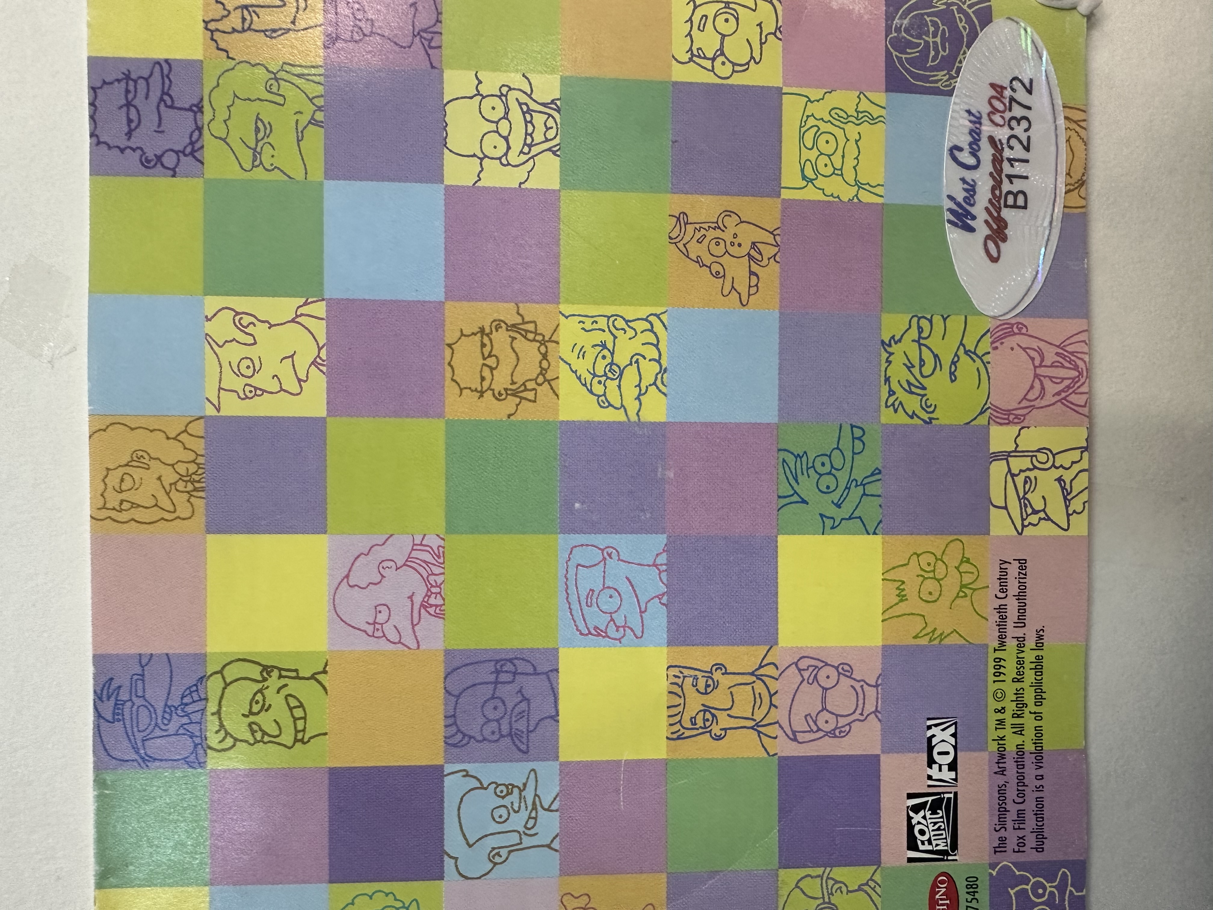 B112372 The Simpsons signed CD booklet signed by Matt Groening with Homer Simpson doodle