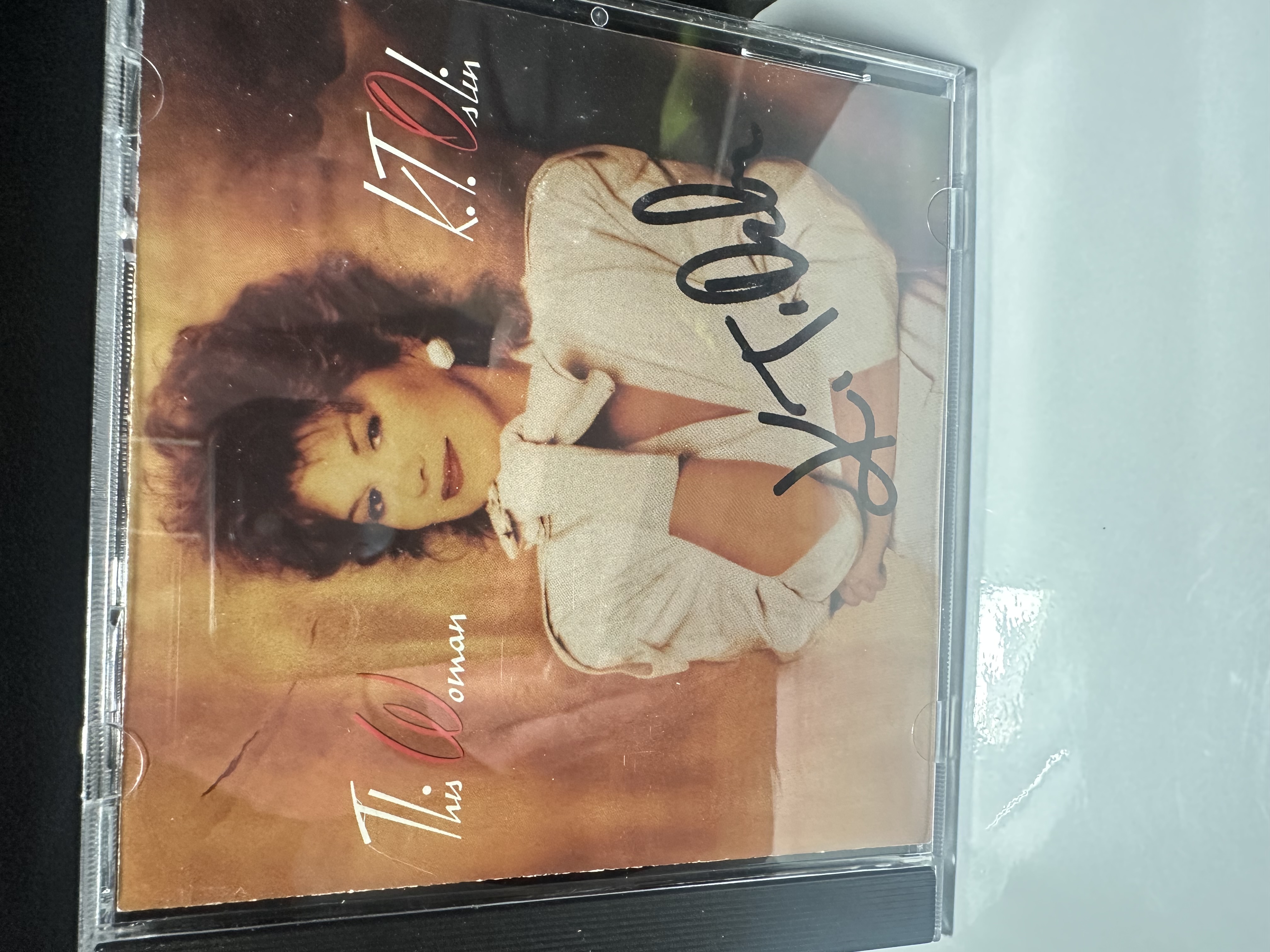 B112432 K.T. Olsen this woman signed autograph CD