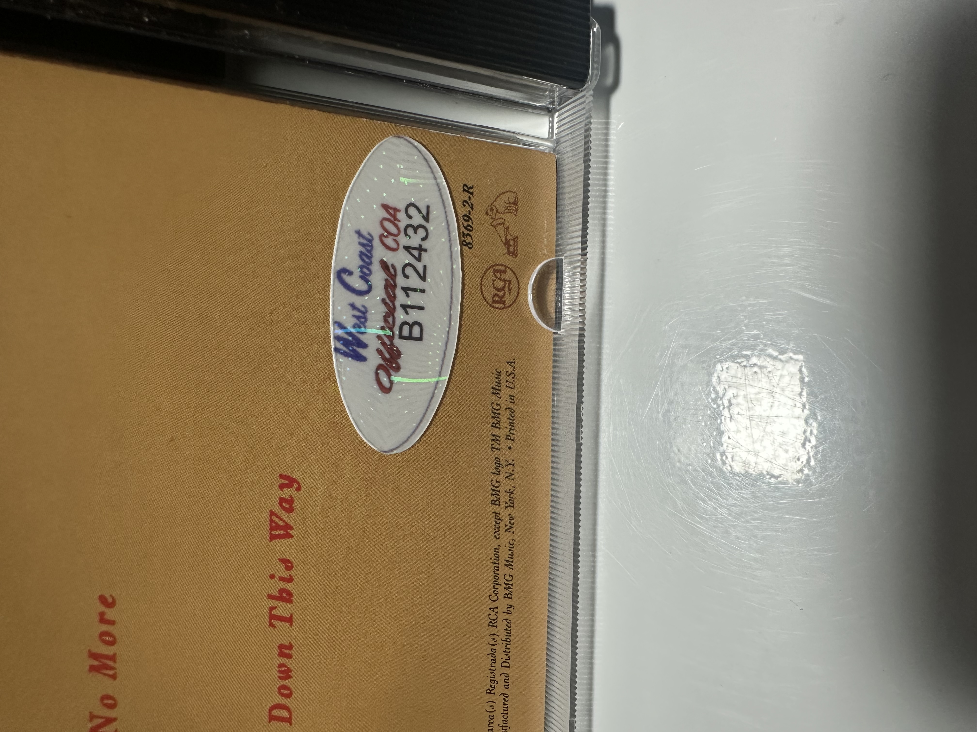 B112432 K.T. Olsen this woman signed autograph CD