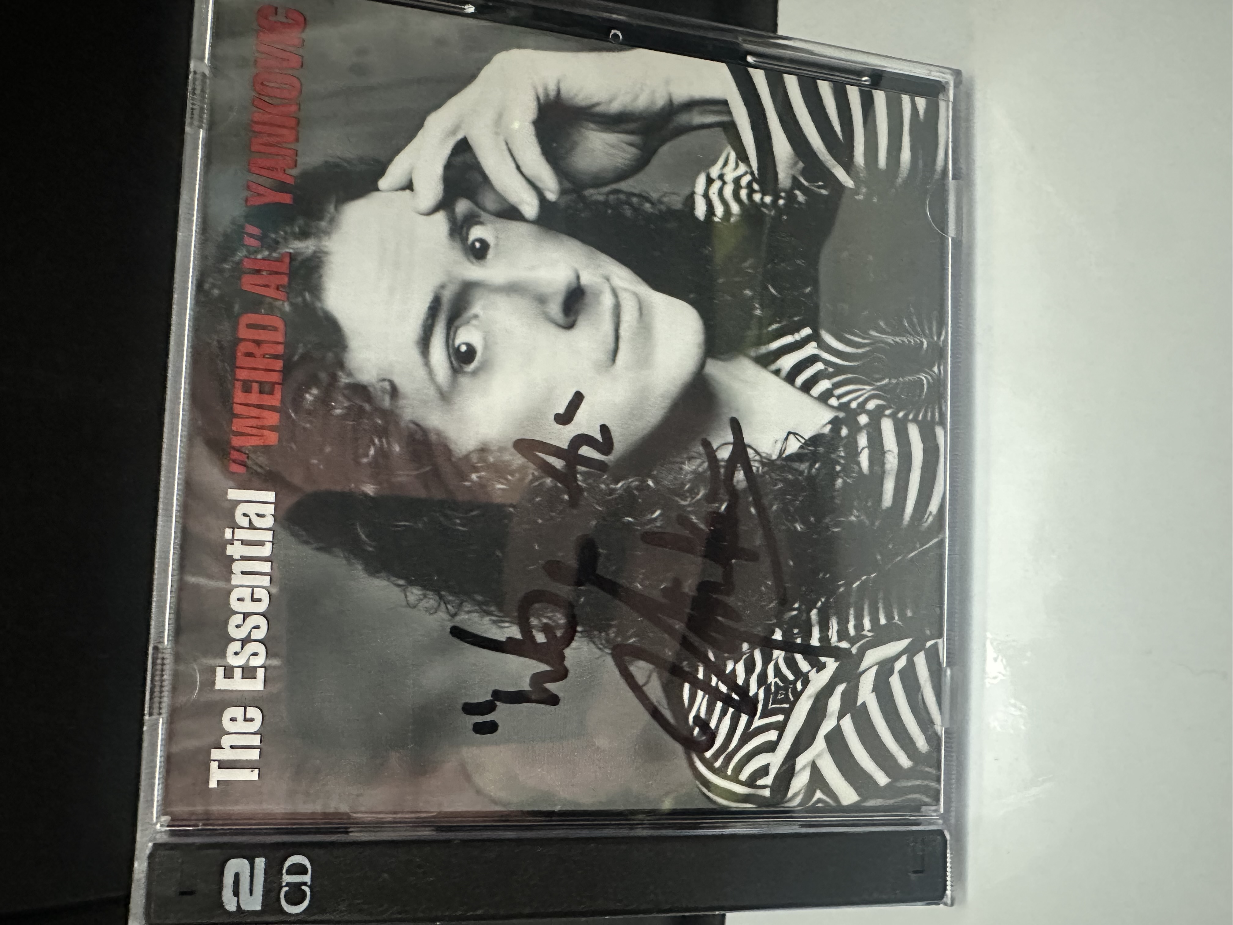 B112482 the essential “Weird Al” Yankovic two disc CD set signed autographed by weird Al