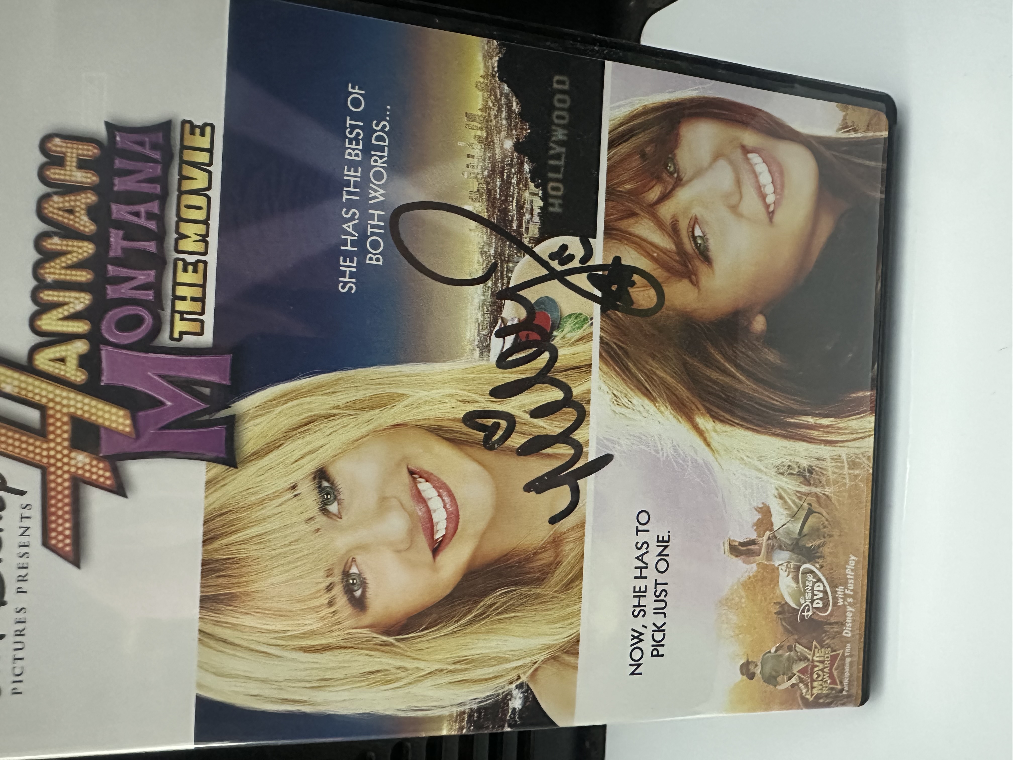 B112402 Hannah Montana the movie signed autographed DVD signed by Miley Cyrus Cyrus