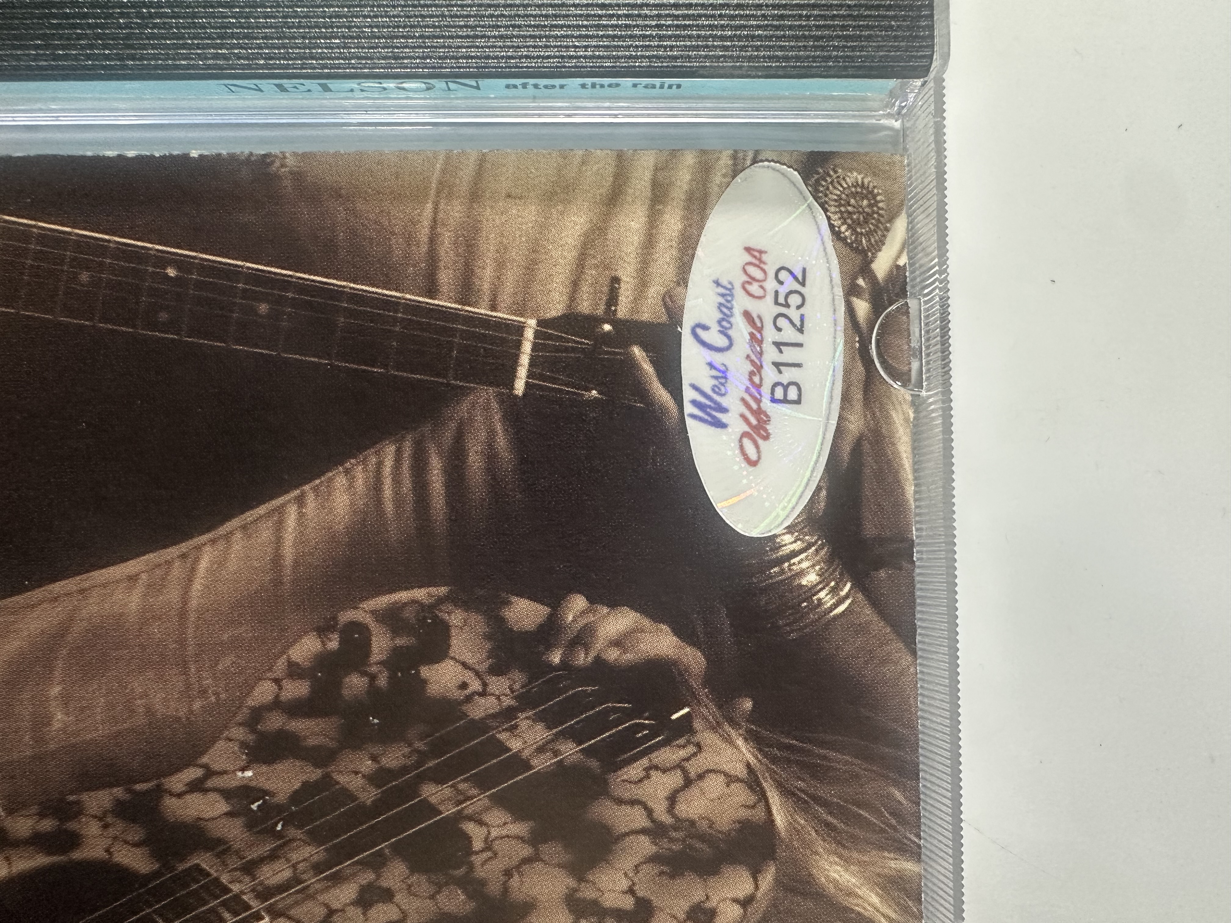 B11252 Nelson’s after the rain signed autograph CD