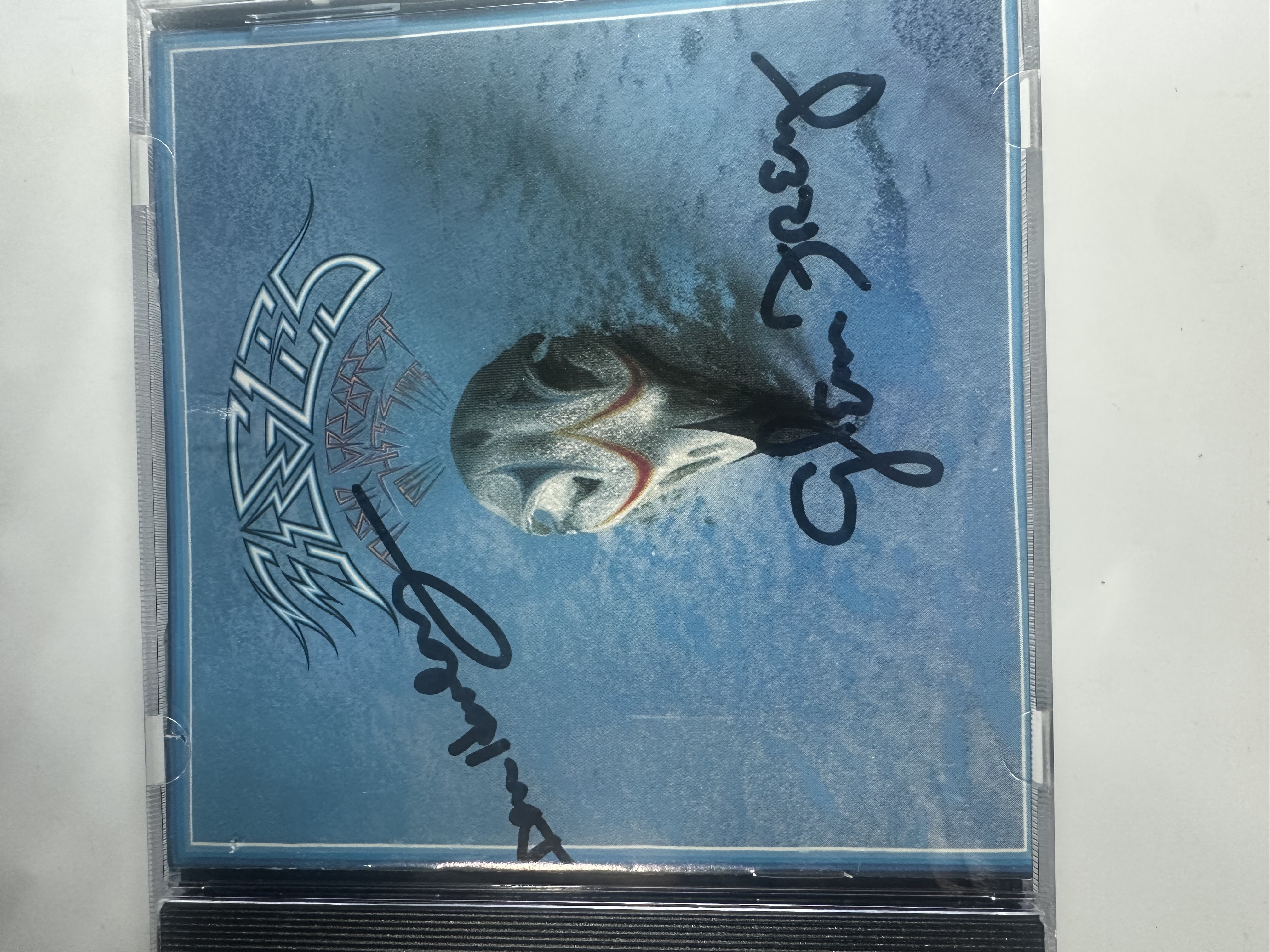 B112522 the Eagles, the greatest hits signed autograph CD signed by Glenn Frey and Don Huey