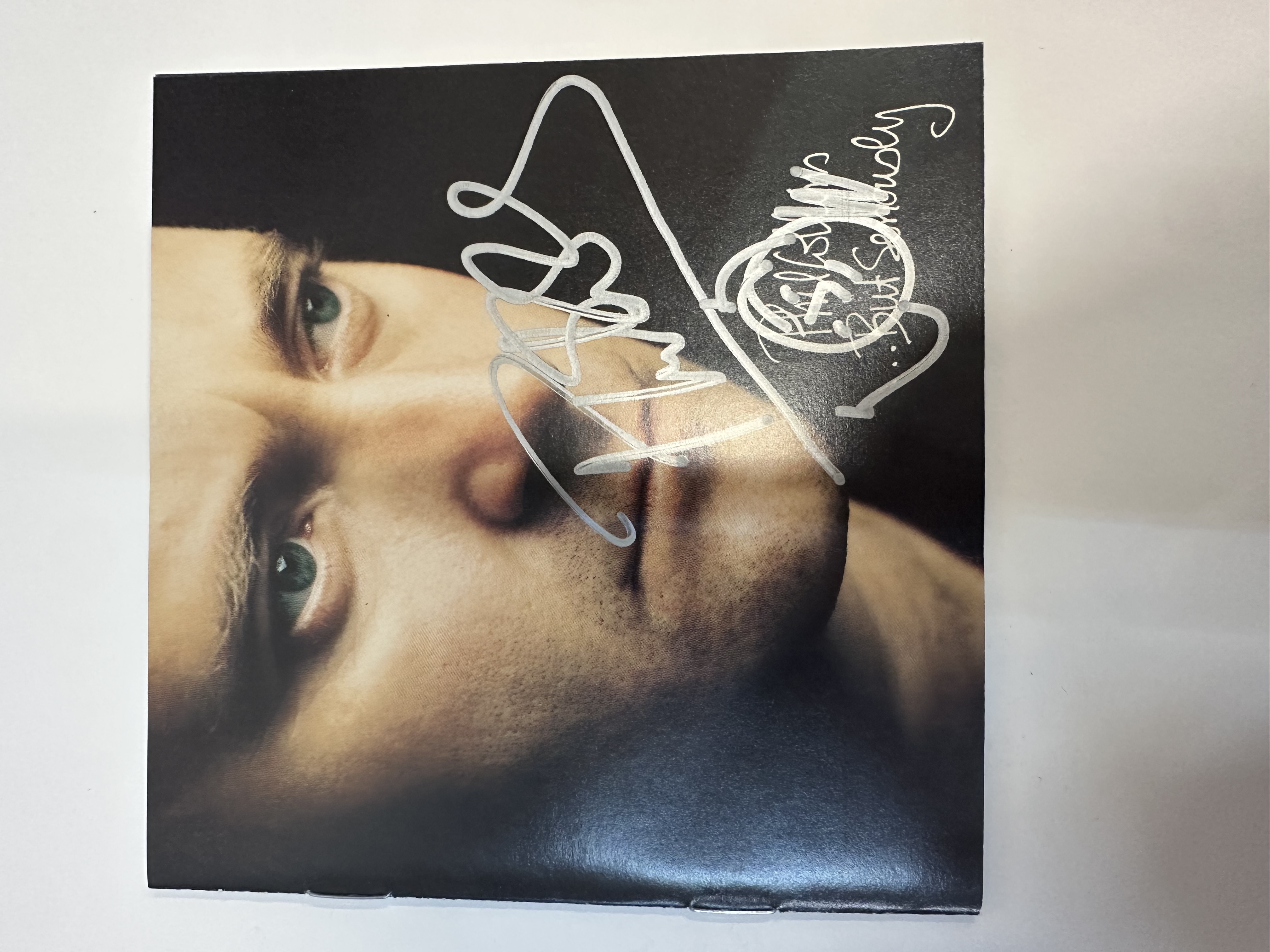 b112391 Phil Collins but seriously signed autograph CD booklet with doodle