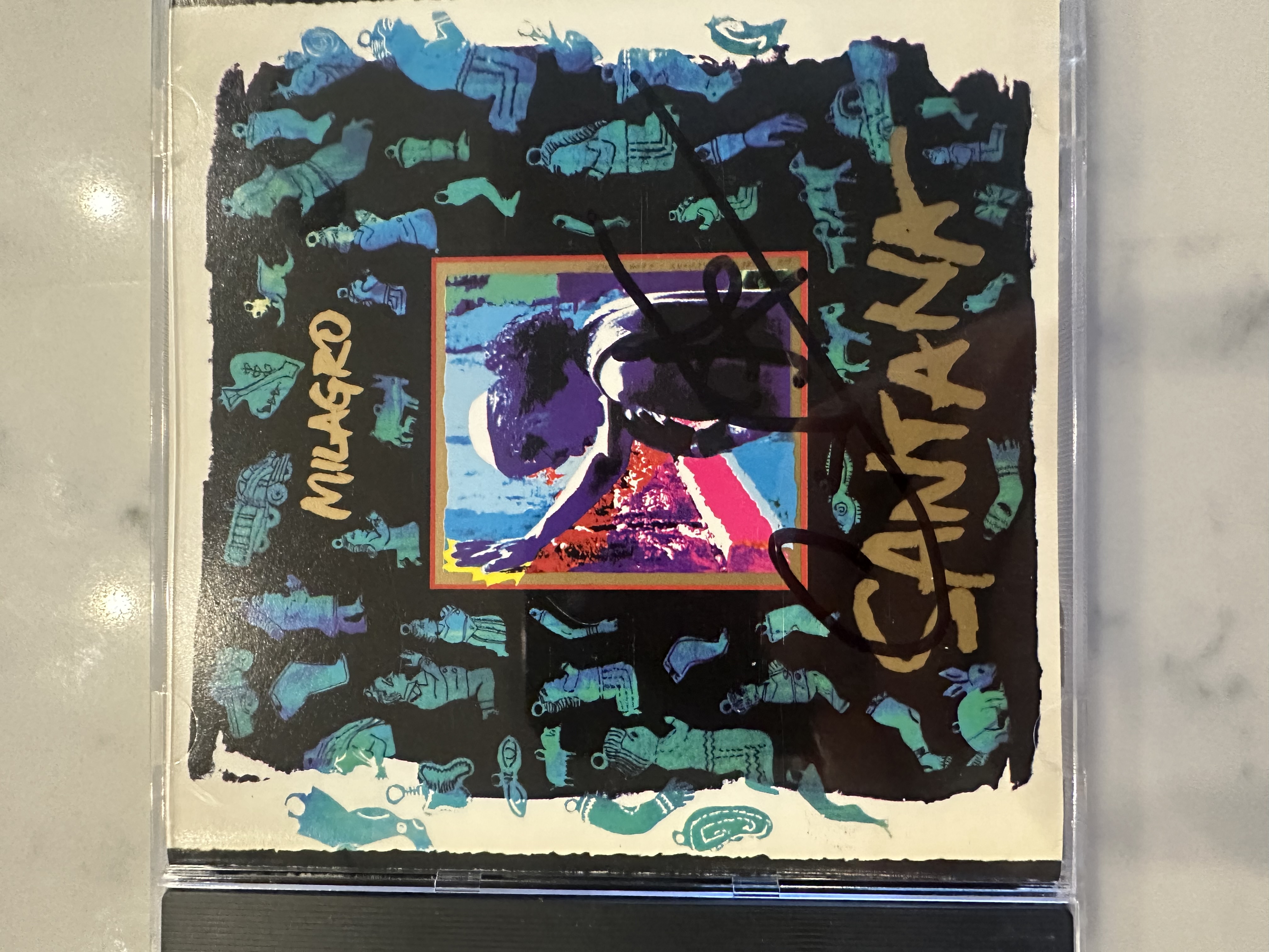 b112893 Santana Na Largo signed autographed CD booklet signed by Carlos Santana