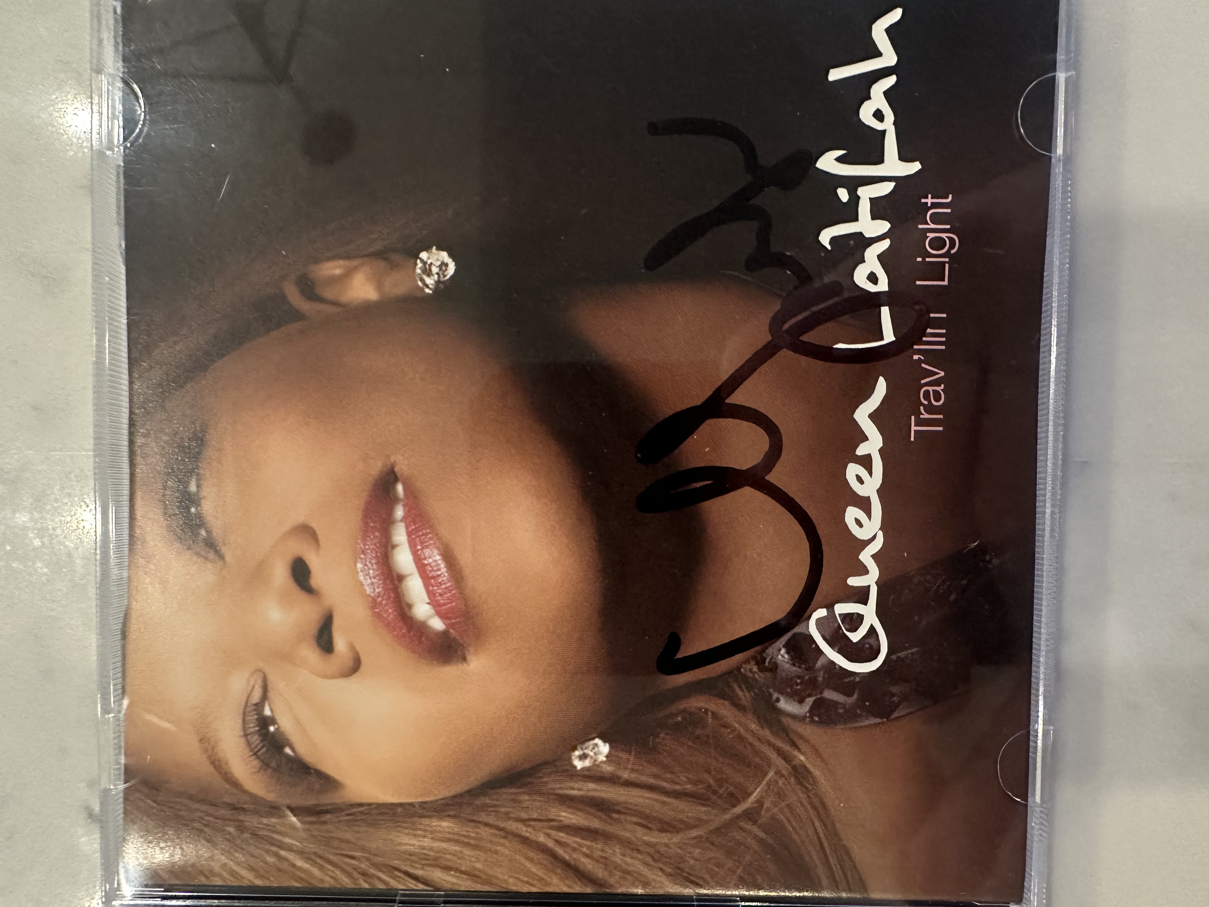 B 112691 Queen Latifah traveling light signed autograph CD