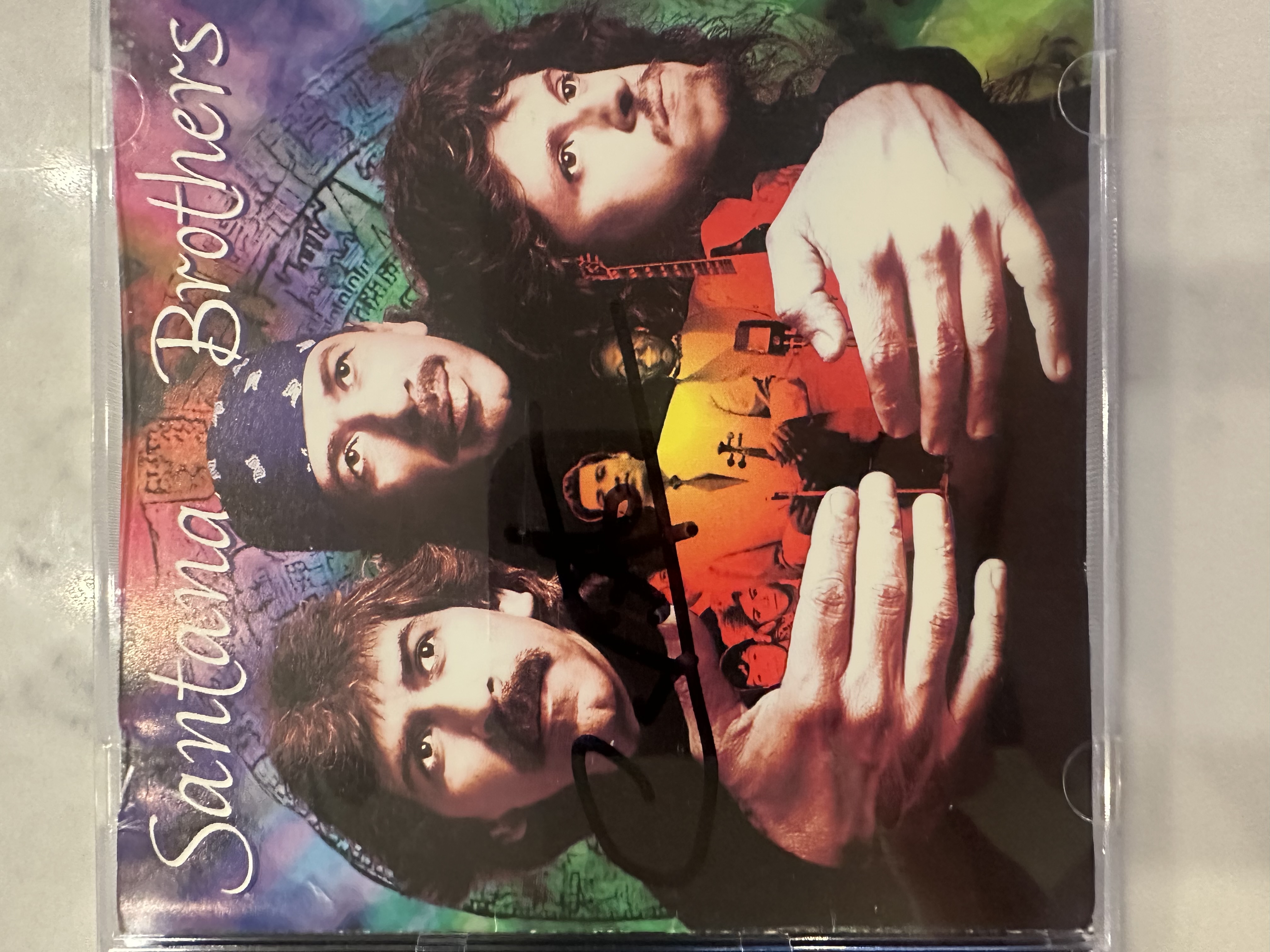 B 112601 Santana Brothers signed autograph CD booklet signed by Carlos Santana