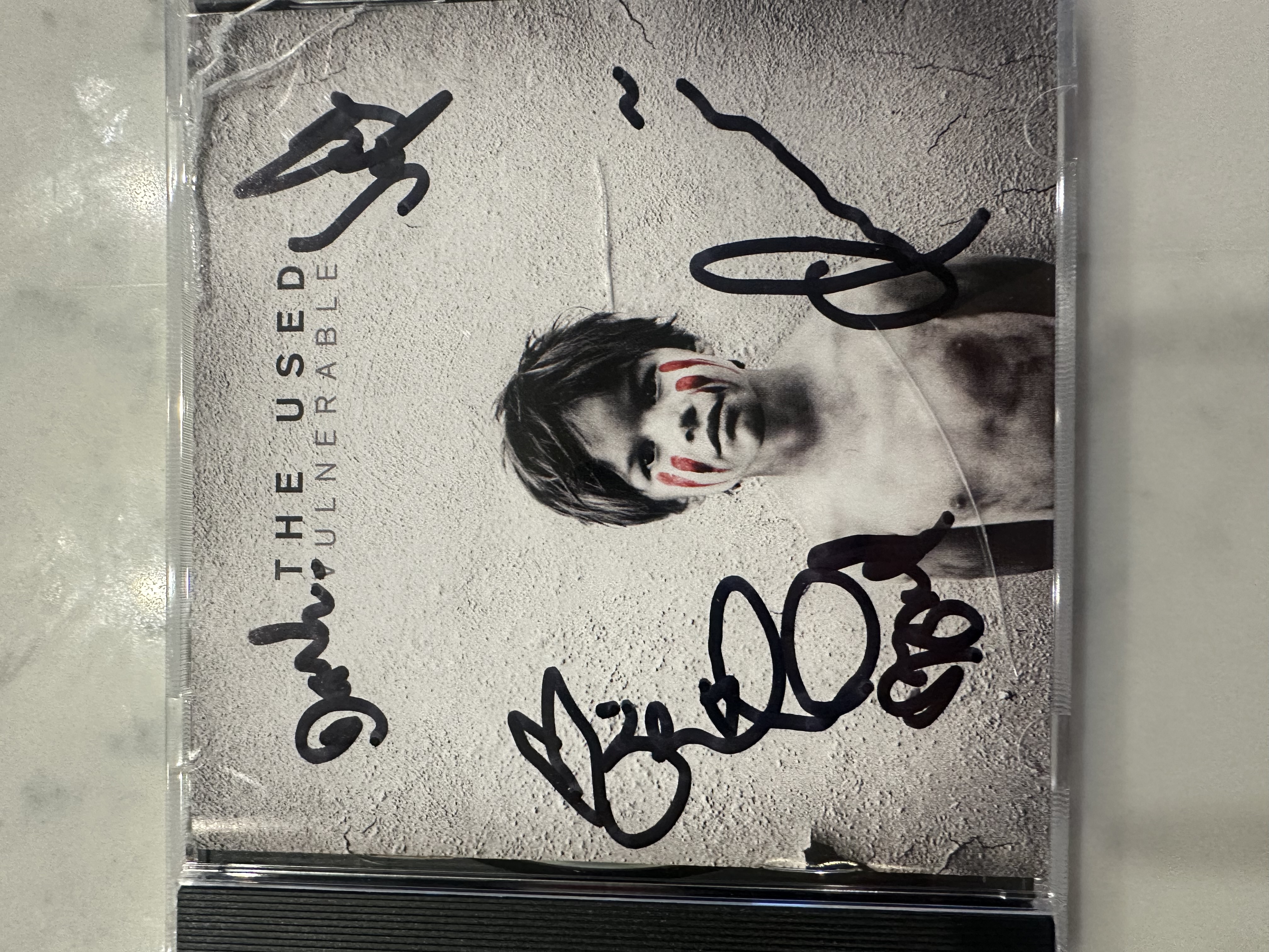 B 112921. They used vulnerable signed autographed CD booklet signed by for band.