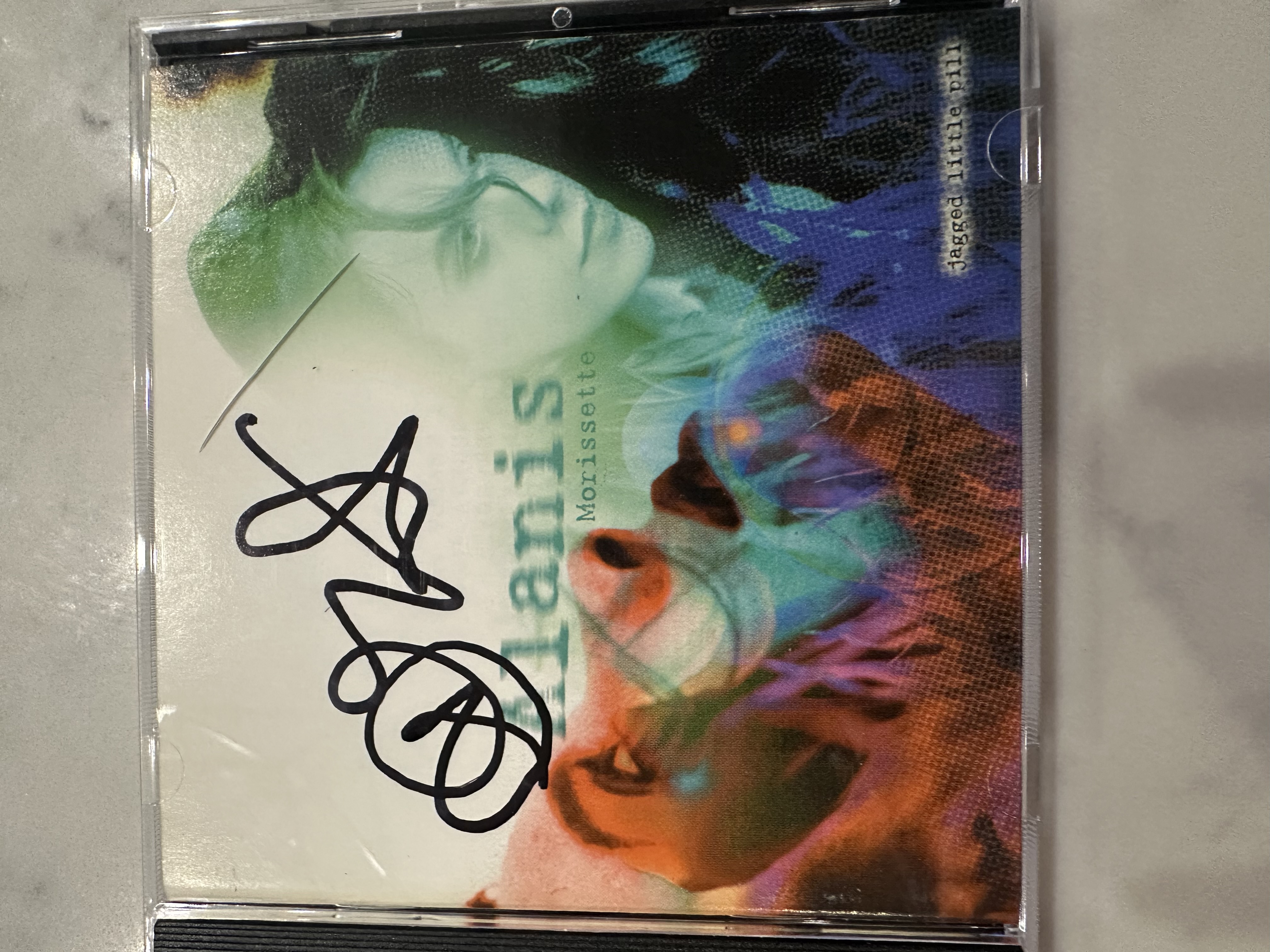 B 112761 Alanis Morissette jagged little pills, sign autograph CD booklet