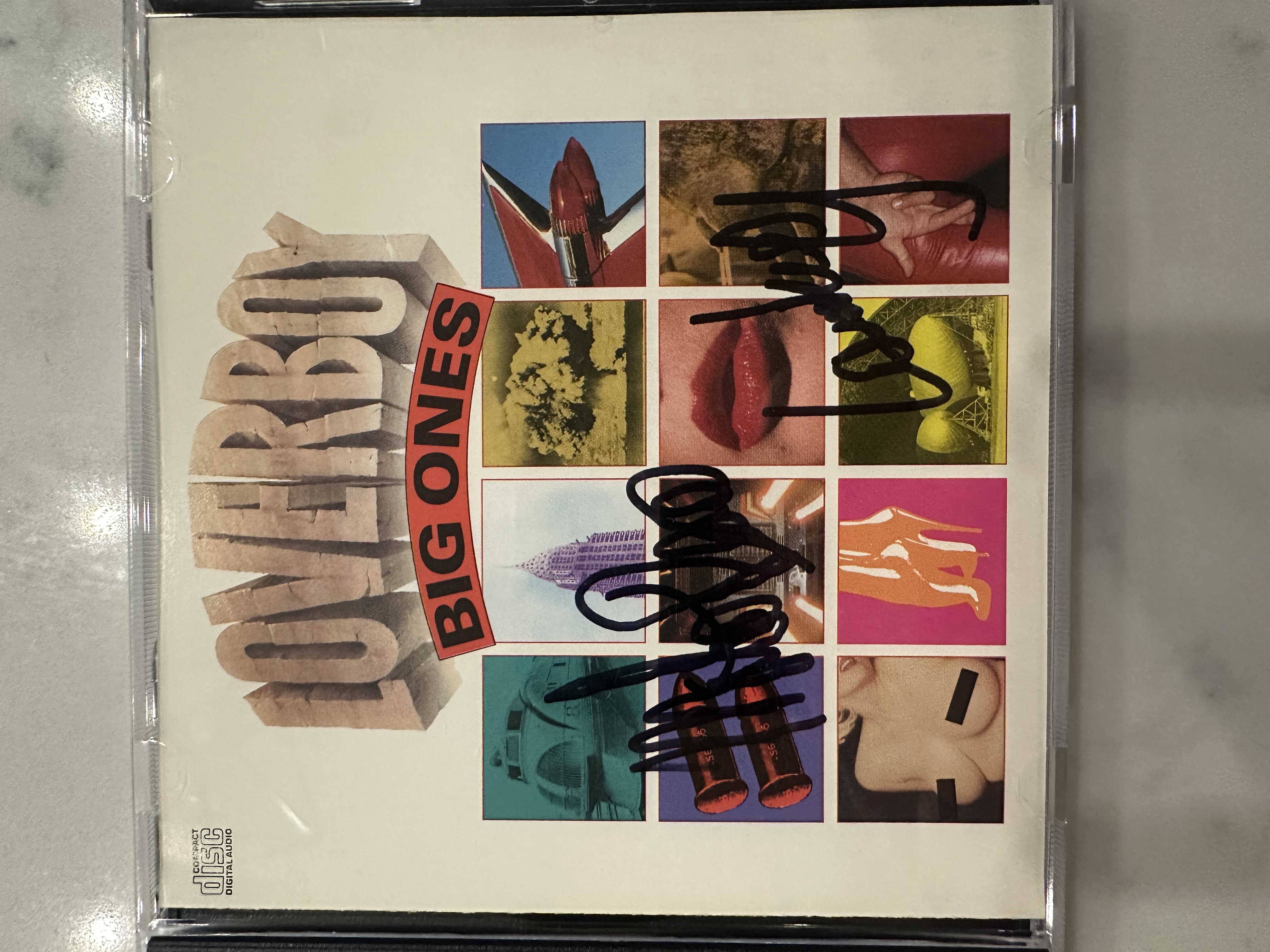 B 112533 loverboy big ones signed autographed CD booklet signed by Mike Reno