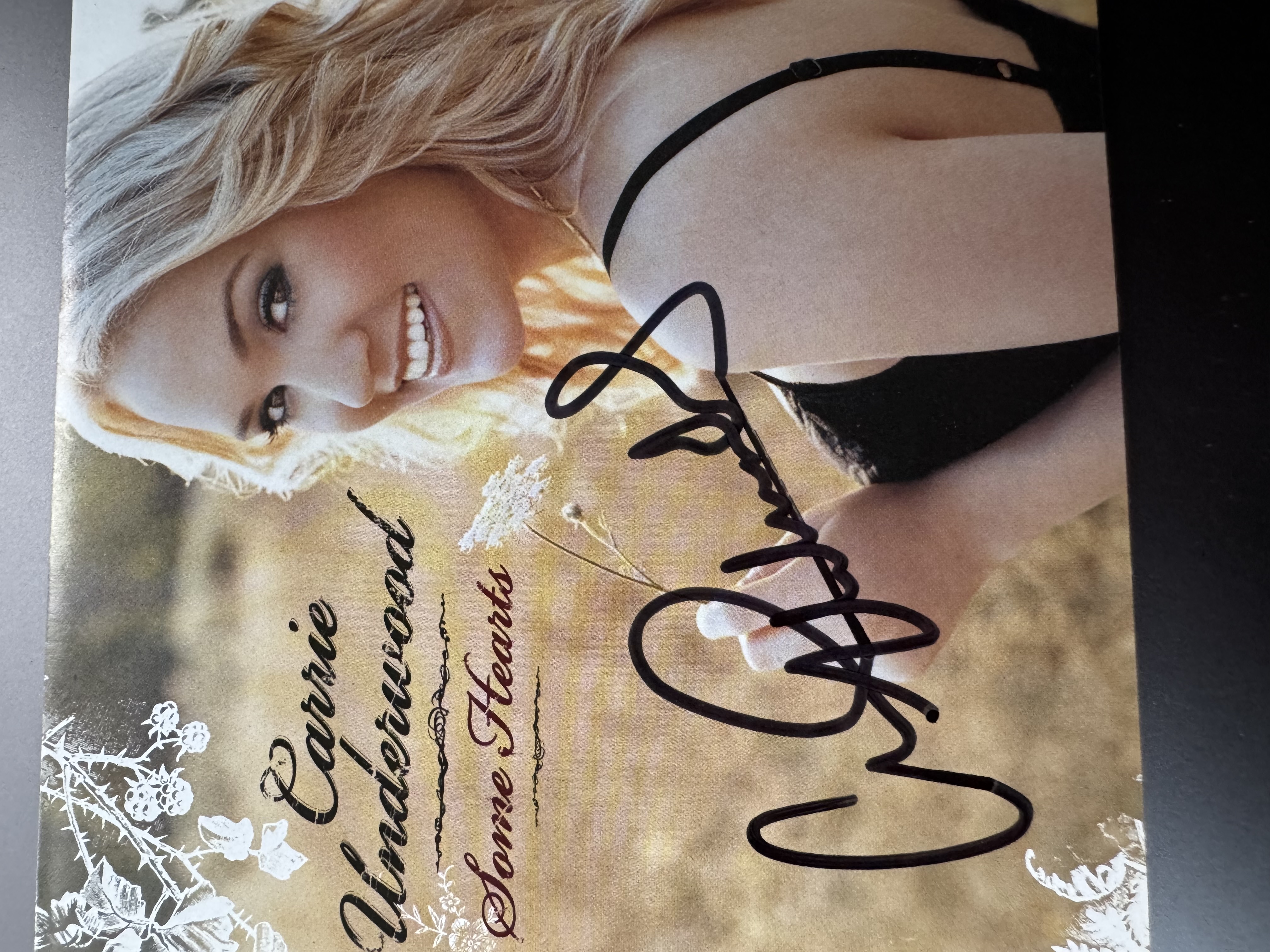 B 112563 Carrie Underwood some hearts signed autographed CD booklet