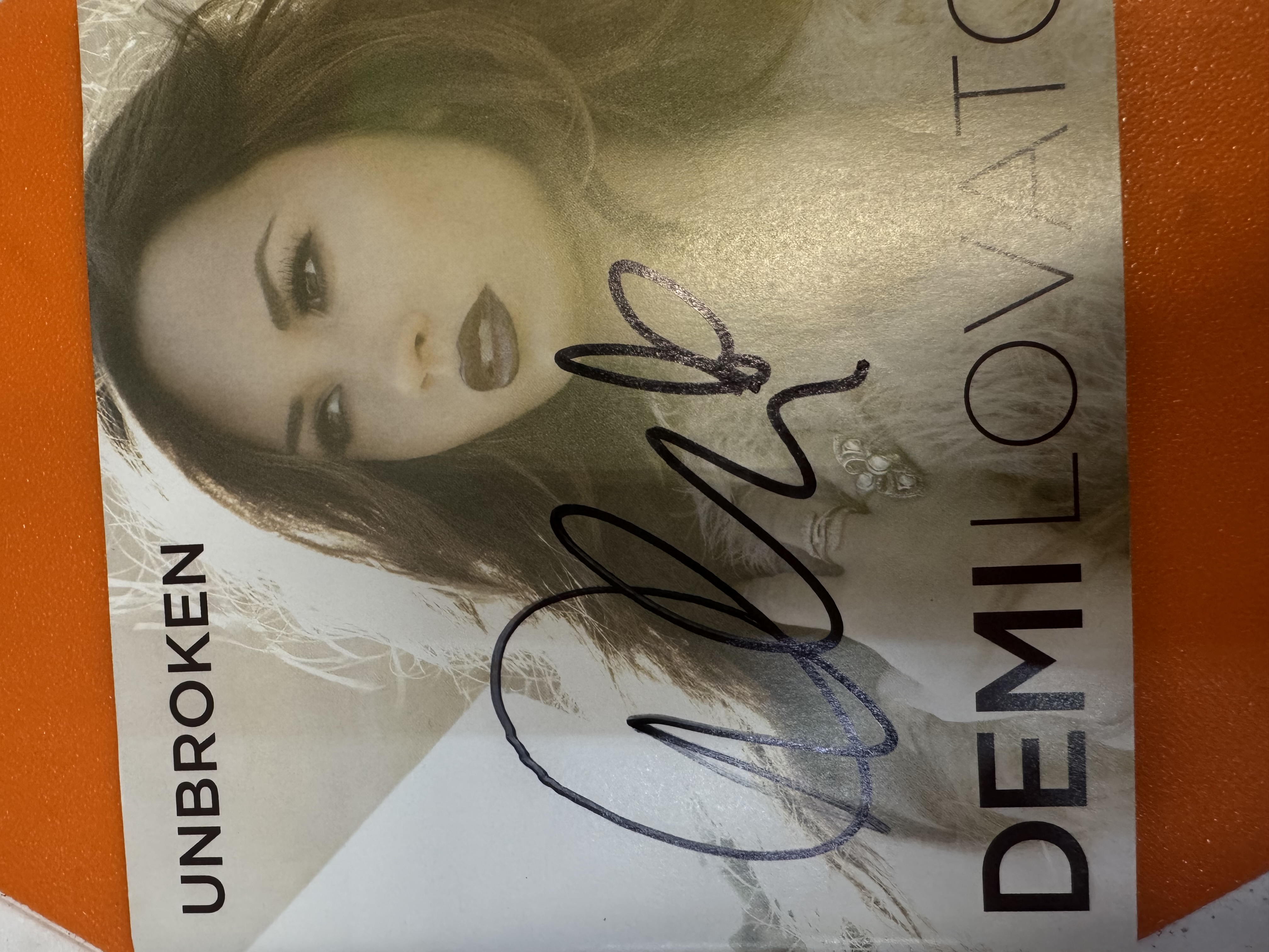 B112364Demi Lovato Unbroken Signed Album Cover
