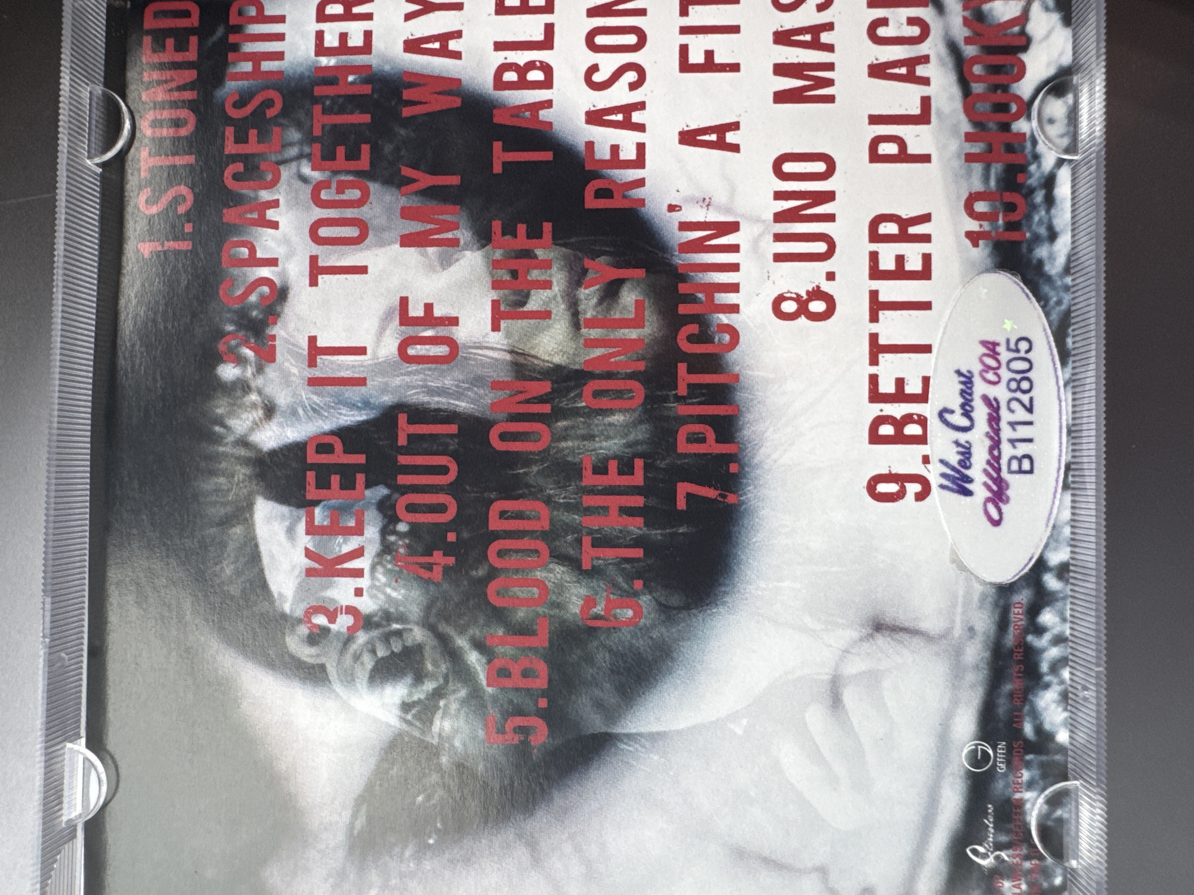 B 112805 Puddle of Mudd songs in the key of love and hate. Signed by Wes Scantlin.